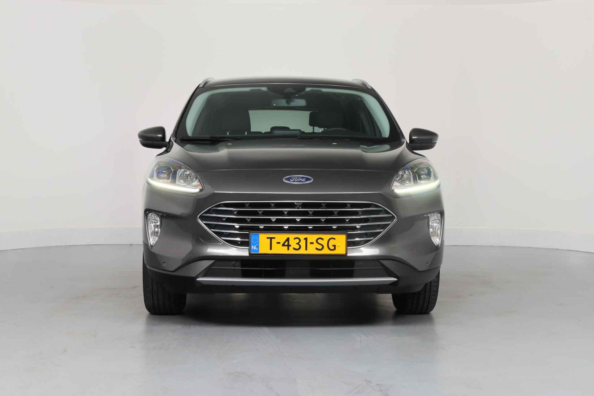 Ford Kuga 2.5 PHEV Titanium | Winter Pack | Camera | Navigatie | Climate Control | Keyless | Cruise Adaptive | Parkeersensoren V+A | Licht - 2/33