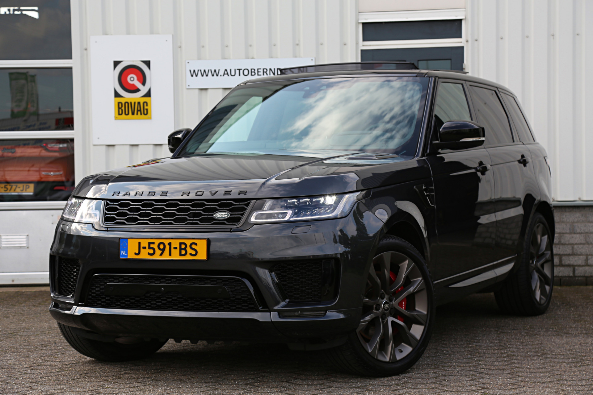 Land Rover Range Rover Sport 3.0 P400 MHEV HST 4WD Aut.*NL-Auto*1ste Eig!*Perfect LR Onderh.*Carbon/Luchtvering/Pano/ACC/Elek. Trekhaak/Meridian/LED/360/HUD/ bij viaBOVAG.nl