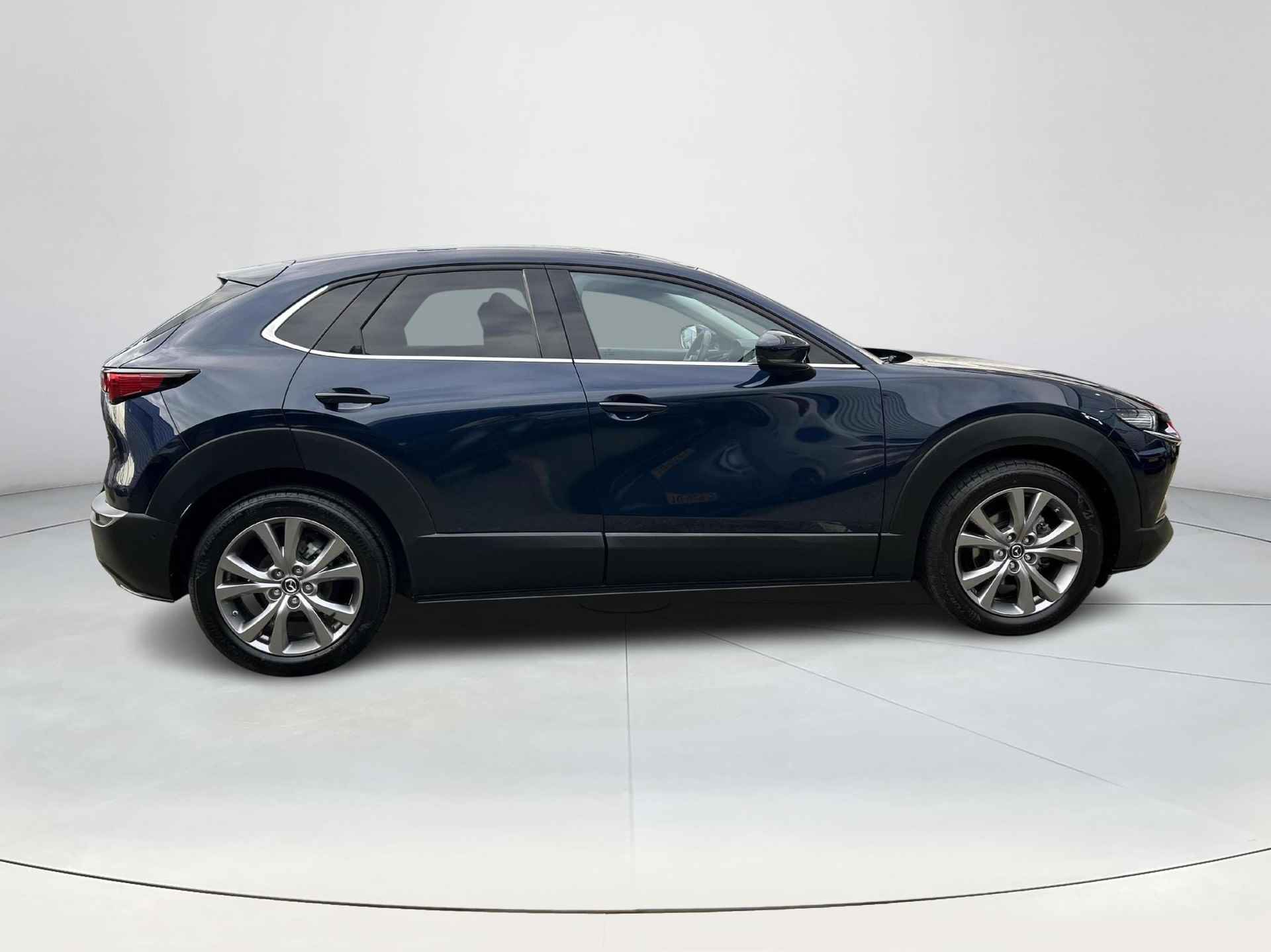 Mazda CX-30 2.0 e-SkyActiv-G M Hybrid Luxury | Rijklaarprijs! | Trekhaak | Navigatie | Camera | Adaptive CC | Climate | Stoel en Stuurverwarming | Inclusief 36 mnd Garantie! - 7/29