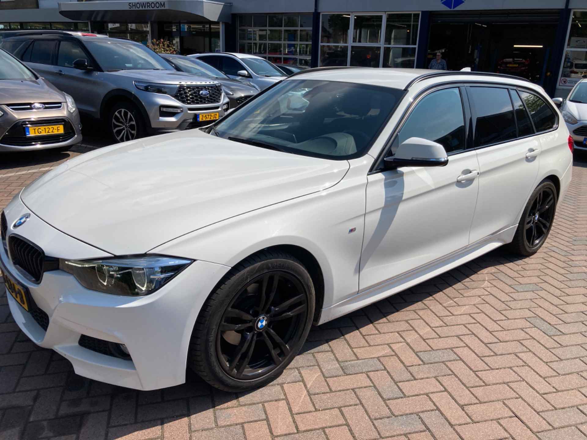 BMW 3 Serie Touring 318i EXECUTIVE | M-SPORT | 18'' LMV | SPORT STOEL | PRIVACY GLASS | LED | NAVI | CLIMATE CONRTOL | PARK SENSOR - 7/28