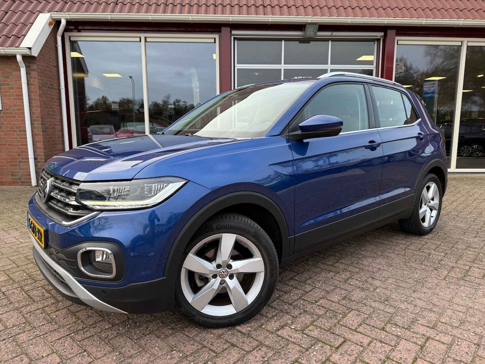 VOLKSWAGEN T-cross 1.0 TSI STYLE AUTOMAAT AIRCO/ECC/NAVIGATIE/PDC VOOR EN ACHTER/EN - 35/38