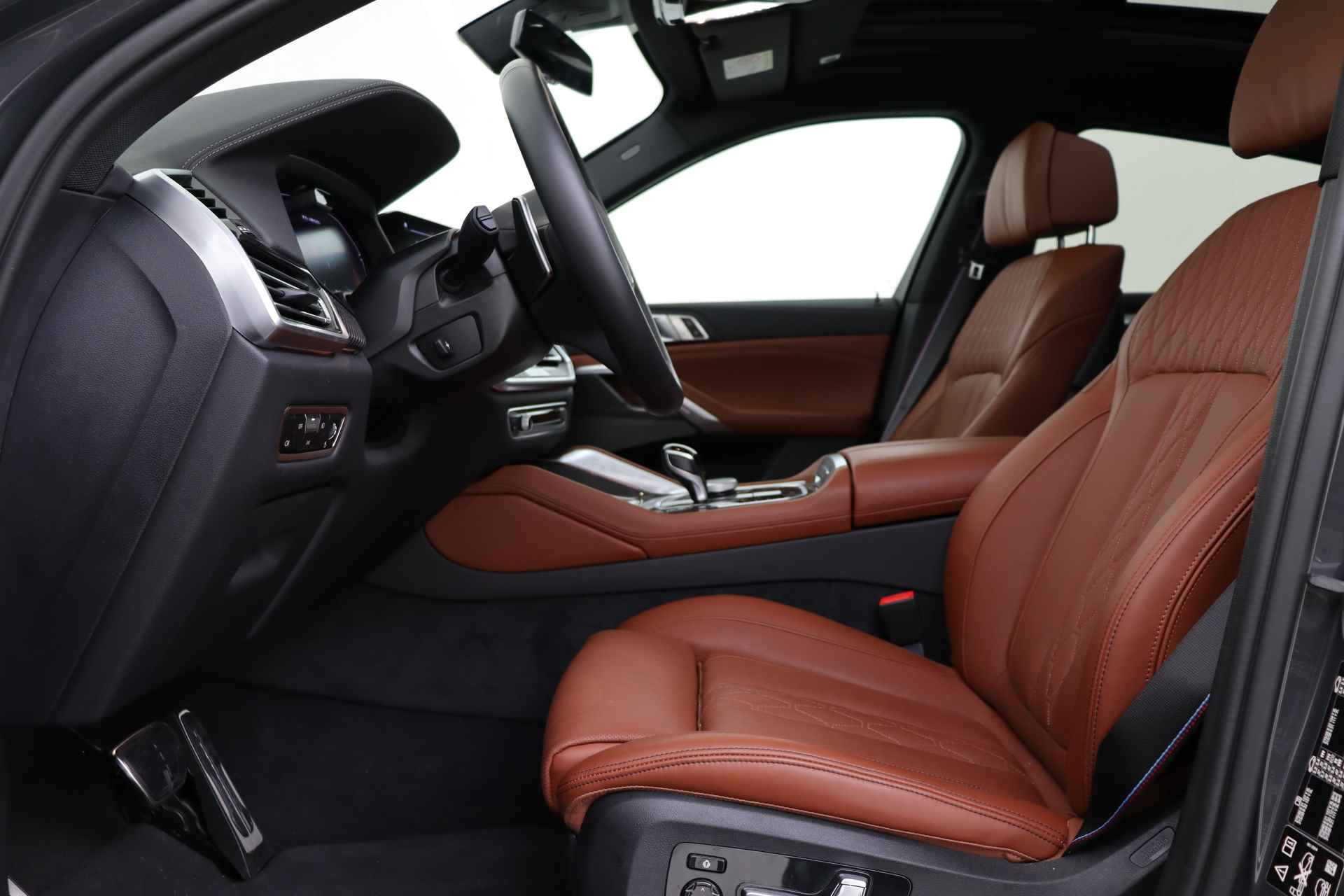 BMW X6 M50i High Executive Automaat / Panoramadak Sky Lounge / Adaptief M Onderstel Professional / Massagefunctie / Laserlight / Trekhaak / Active Steering / Soft-Close - 9/94