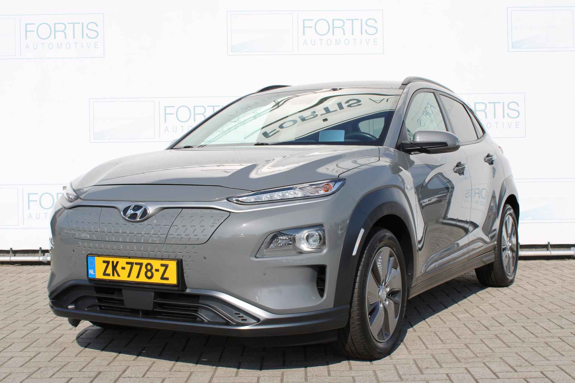 Hyundai KONA EV Premium 64 kWh NL AUTO | LEDER | CARPLAY | - 1/36