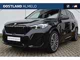 BMW iX1 xDrive30 High Executive M Sport / Panoramadak / Trekhaak / Sportstoelen / Adaptief M Onderstel / Adaptieve LED / Parking Assistant Plus / Comfort Access