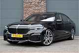 BMW 7 Serie 745Le M Sport High Executive Aut8 | Schuifdak | Luchtvering | Achterasbesturing | Adaptieve Cruise Control | Massage V+A | Zonnescherm Zijruiten | Harman&Kardon | Verwarmd Stuurwiel | Stoelventilatie | Soft-Close | HUD | Laserl