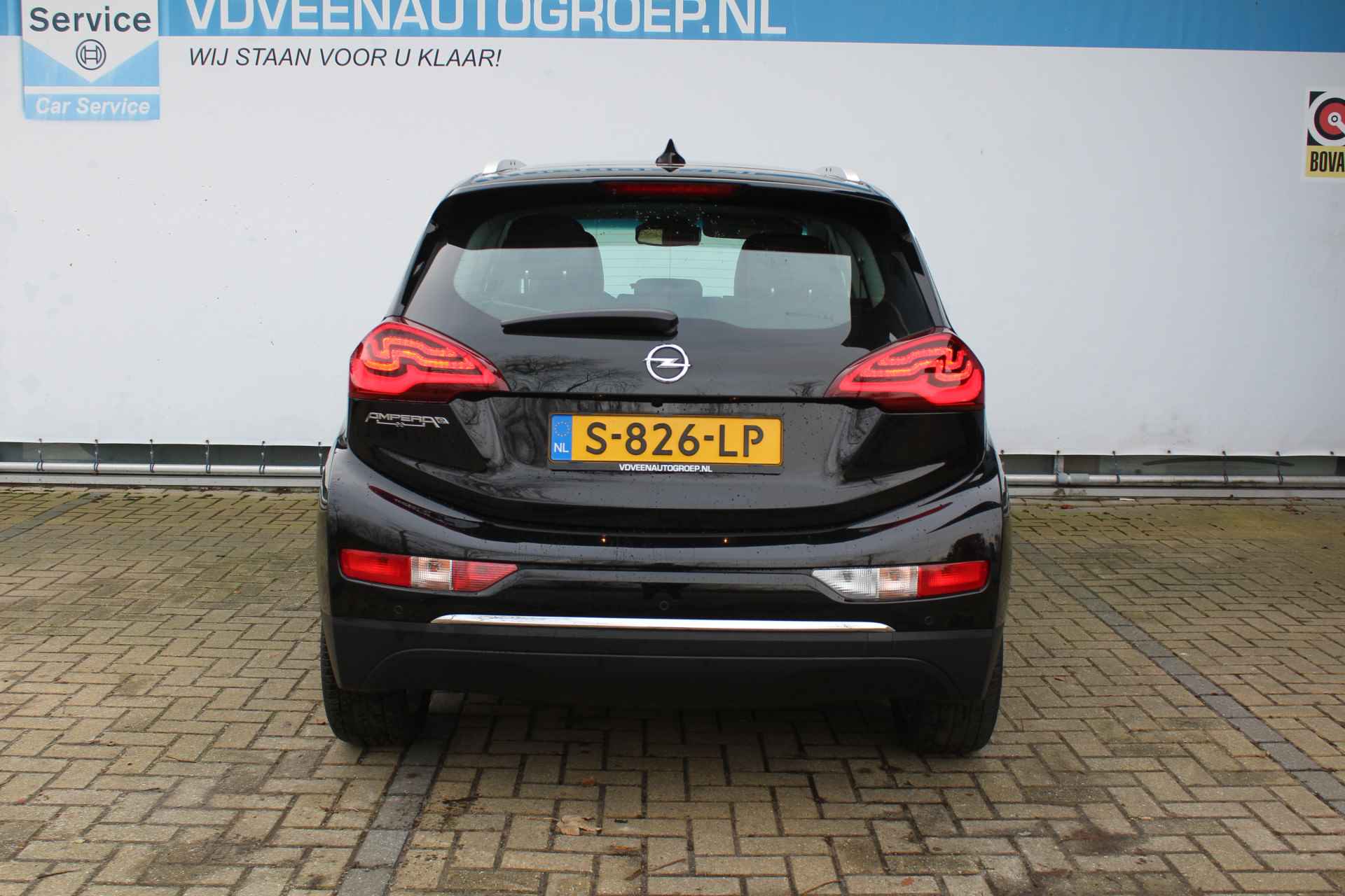 Opel Ampera-E Business executive 60 kWh 204pk | Incl. 1 jaar Garantie | Wegenbelastingvrij tot 2030 | DAB+ | BOSE | Cruise | Stoelverwarming Voor & achter | Apple Carplay | Parkeersensoren V+A | Lederen bekleding | Achteruitrijcamera | Keyless entry/start | Bluetooth | Lane Assist | Stuurverwarming | Dealer onderhouden | - 7/53
