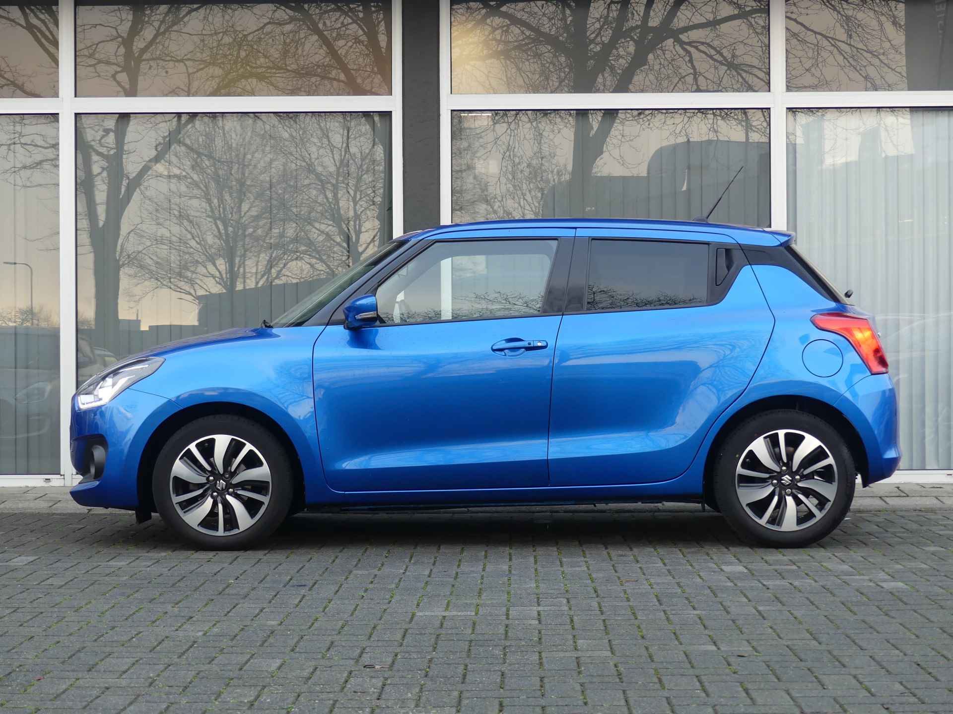 Suzuki Swift 1.2 Stijl Smart Hybrid Dealeronderhouden, NL auto, Navigatie, Cruise control - 4/29