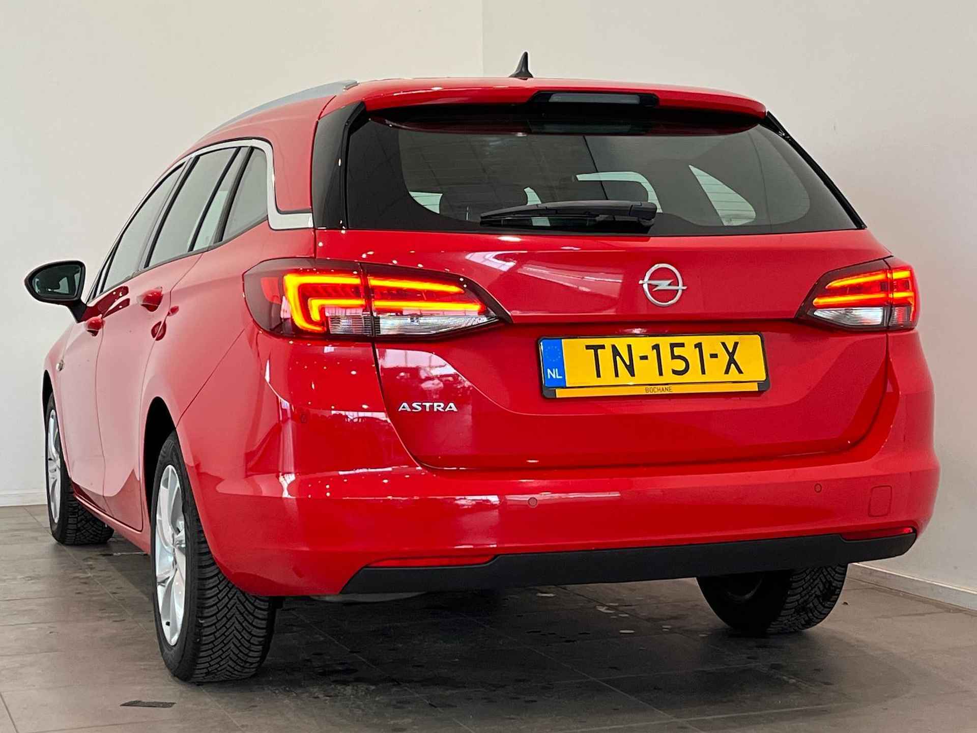 Opel Astra Sports Tourer 1.0 Turbo Business Executive CLIMA | CRUISE | NAVI | PDC | ELECTRISCHE ACHTERKLEP | ALL SEASON BANDEN - 23/39