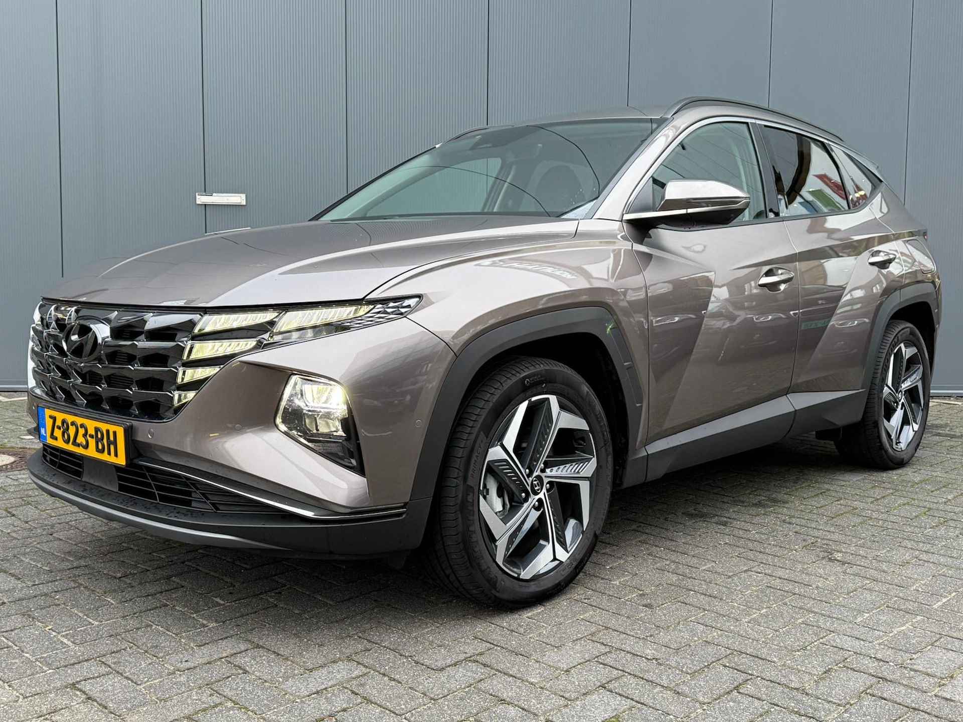 Hyundai Tucson 1.6 T-GDI PHEV 265pk Premium 4WD | Elektrische achterklep | Stoelventilatie | Leder | Adaptive cruise controle | Bestuurdersstoe - 2/3