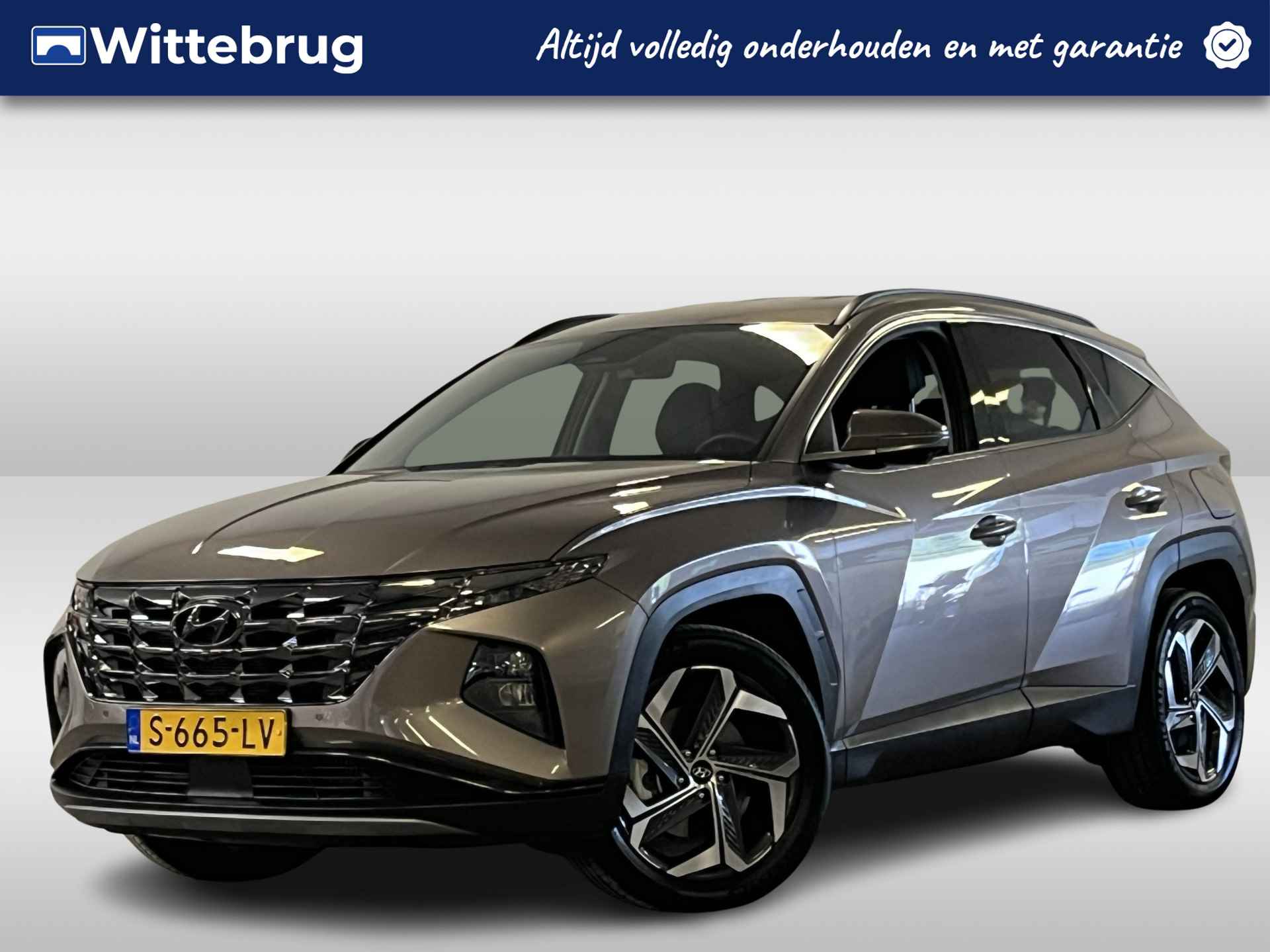 Hyundai Tucson 1.6 T-GDI HEV Premium Automaat | Leder | Elektr. Stoelverstelling | Camera - 1/39