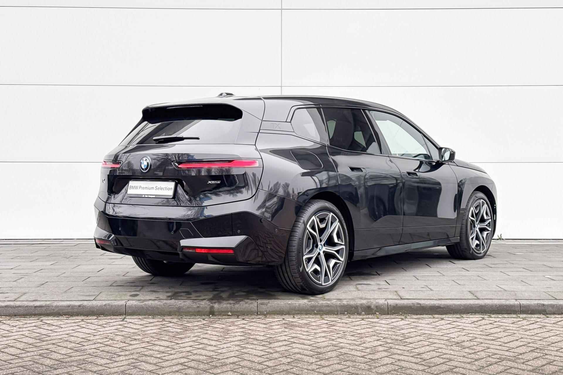 BMW iX xDrive40 Business Edition Plus 77 kWh | Harman Kardon | Driving Assistant Pro | Stoelverwarming | Trekhaak | - 5/25