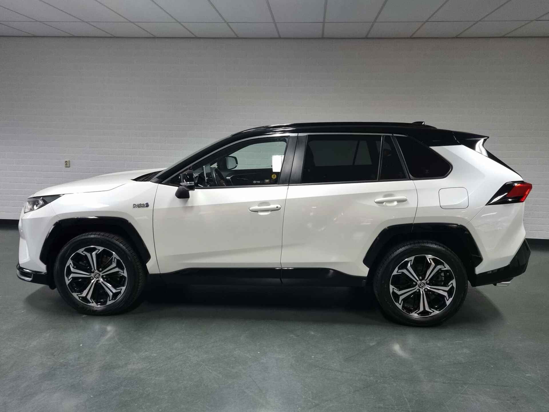 Toyota RAV4 2.5 Plug-in Hybrid AWD Bi-Tone Plus JBL / Pano / Trekhaak - 4/91