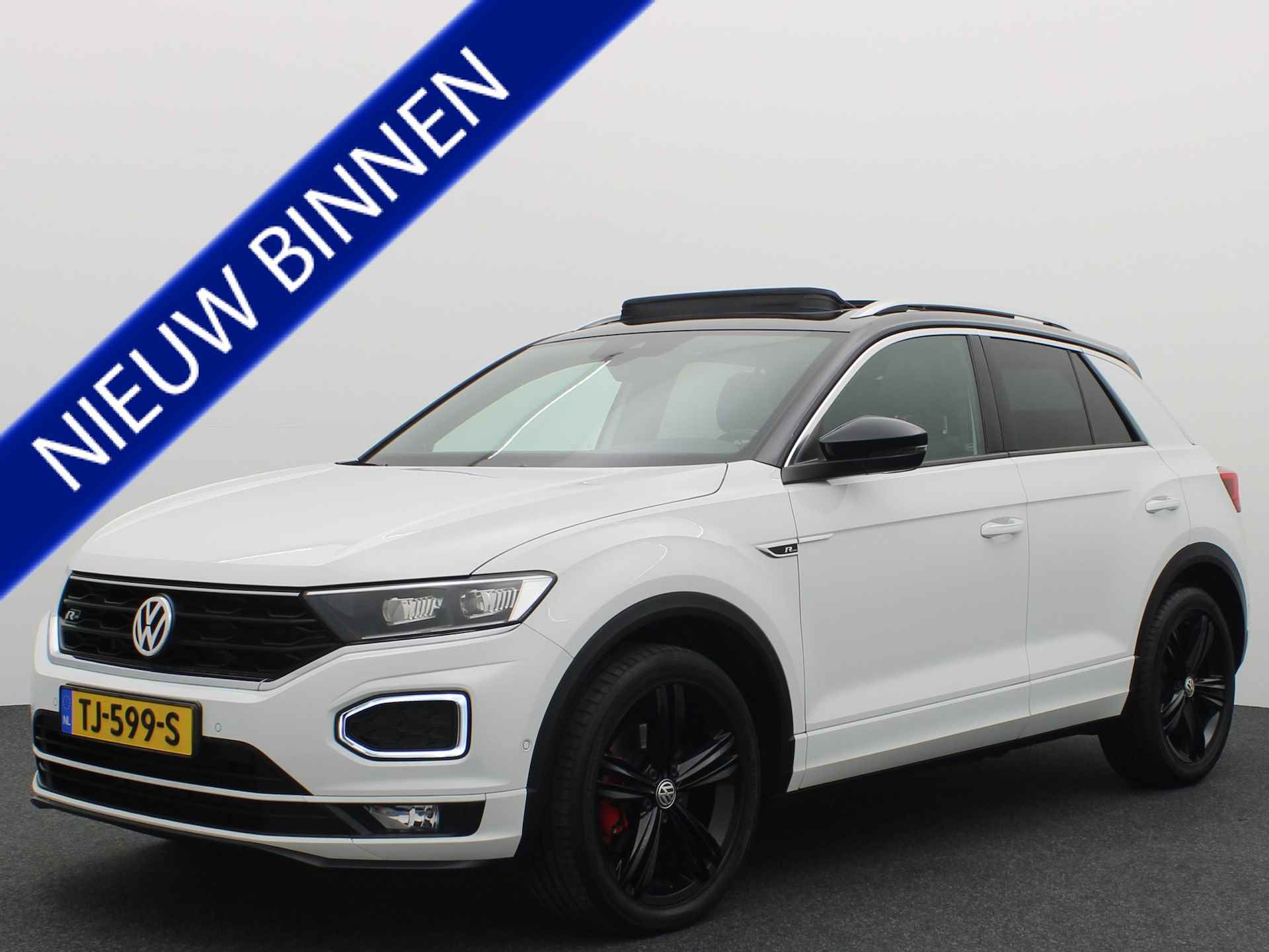 Volkswagen T-Roc 2.0 TSI 4Motion Sport AUTOMAAT / PANORAMADAK / FULL LED / BEATS / TREKHAAK / CAMERA / VIRTUAL / STOELVERW / KEYLESS / NL-AUTO - 1/63