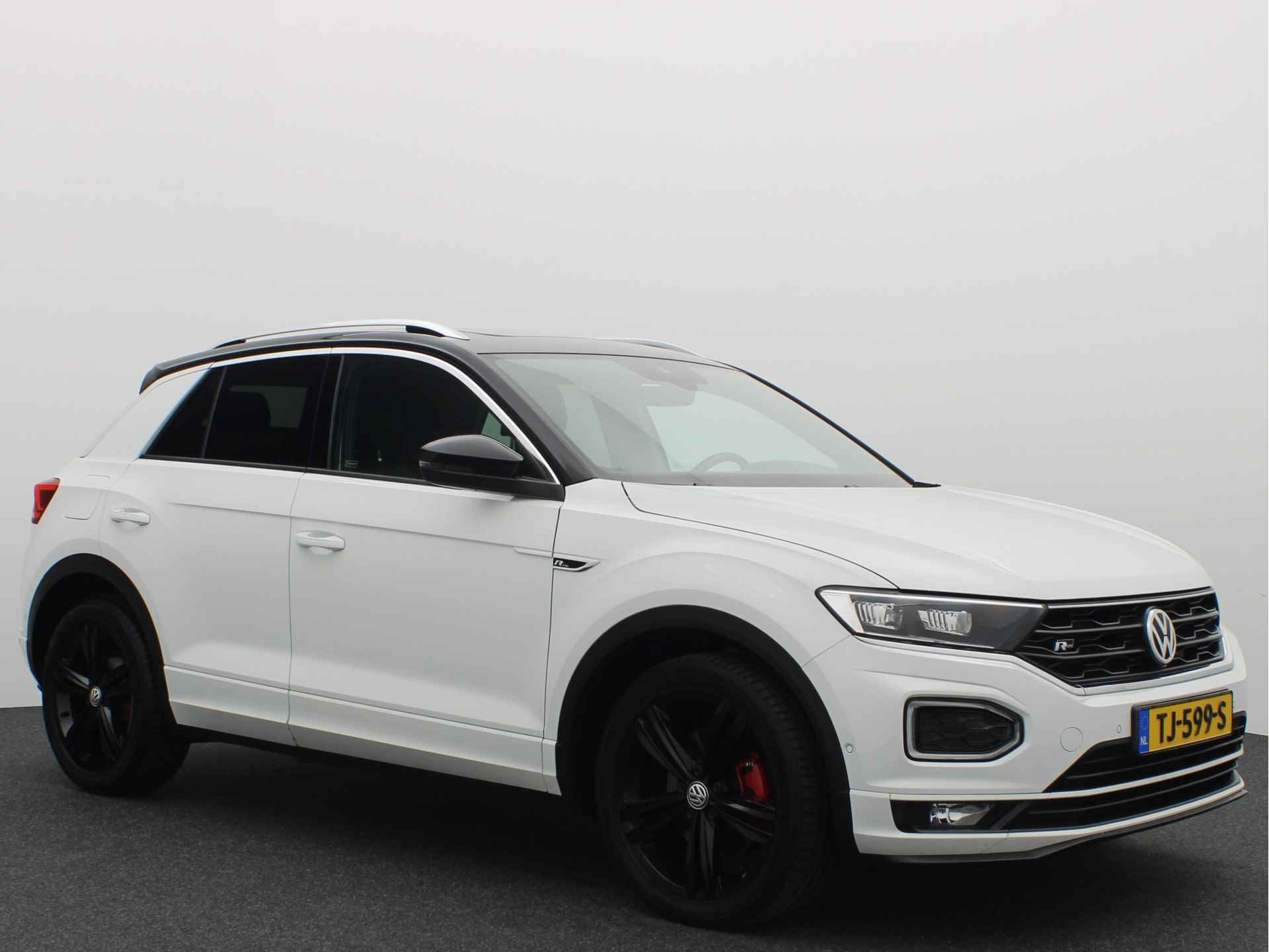 Volkswagen T-Roc 2.0 TSI 4Motion Sport AUTOMAAT / PANORAMADAK / FULL LED / BEATS / TREKHAAK / CAMERA / VIRTUAL / STOELVERW / KEYLESS / NL-AUTO - 23/63