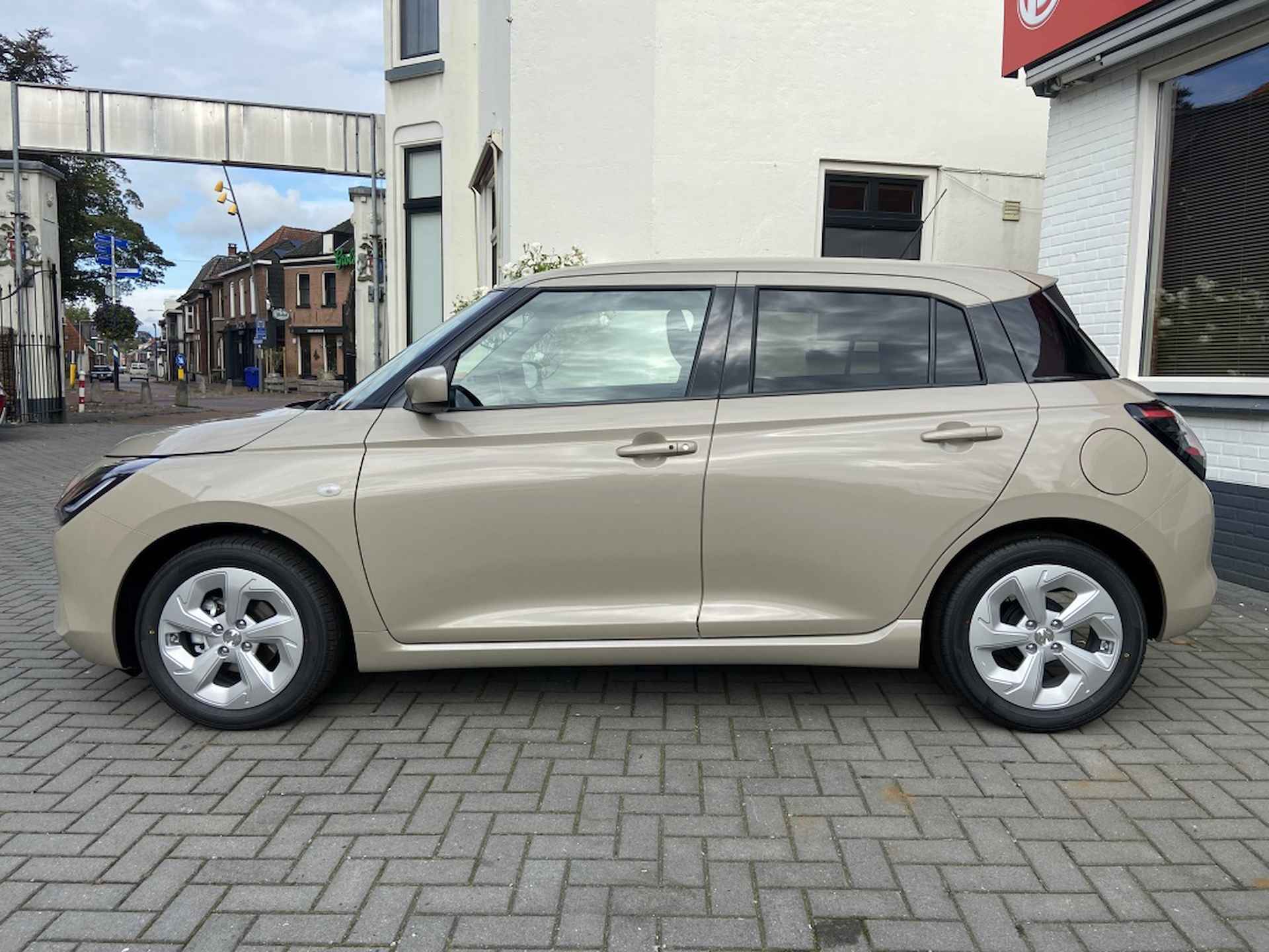 Suzuki Swift 1.2 Select [HYBRIDE | CARPLAY | NAVIGATIE | CAMERA] - 4/34