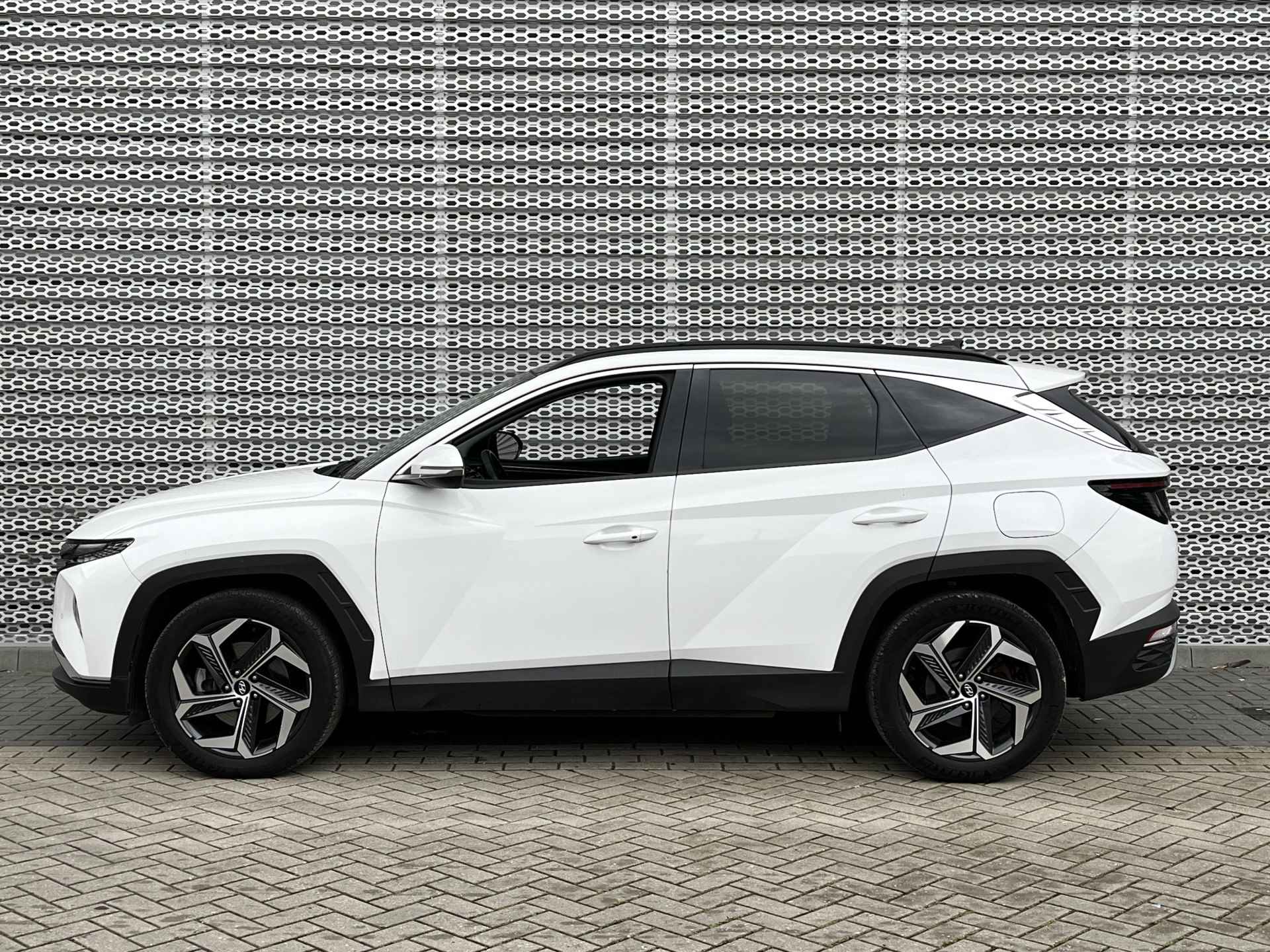 Hyundai Tucson 1.6 T-GDI PHEV Comfort Sky 4WD PANORAMADAK SCHUIF/KANTEL | NAVIGATIE | 19 INCH VELGEN - 9/39