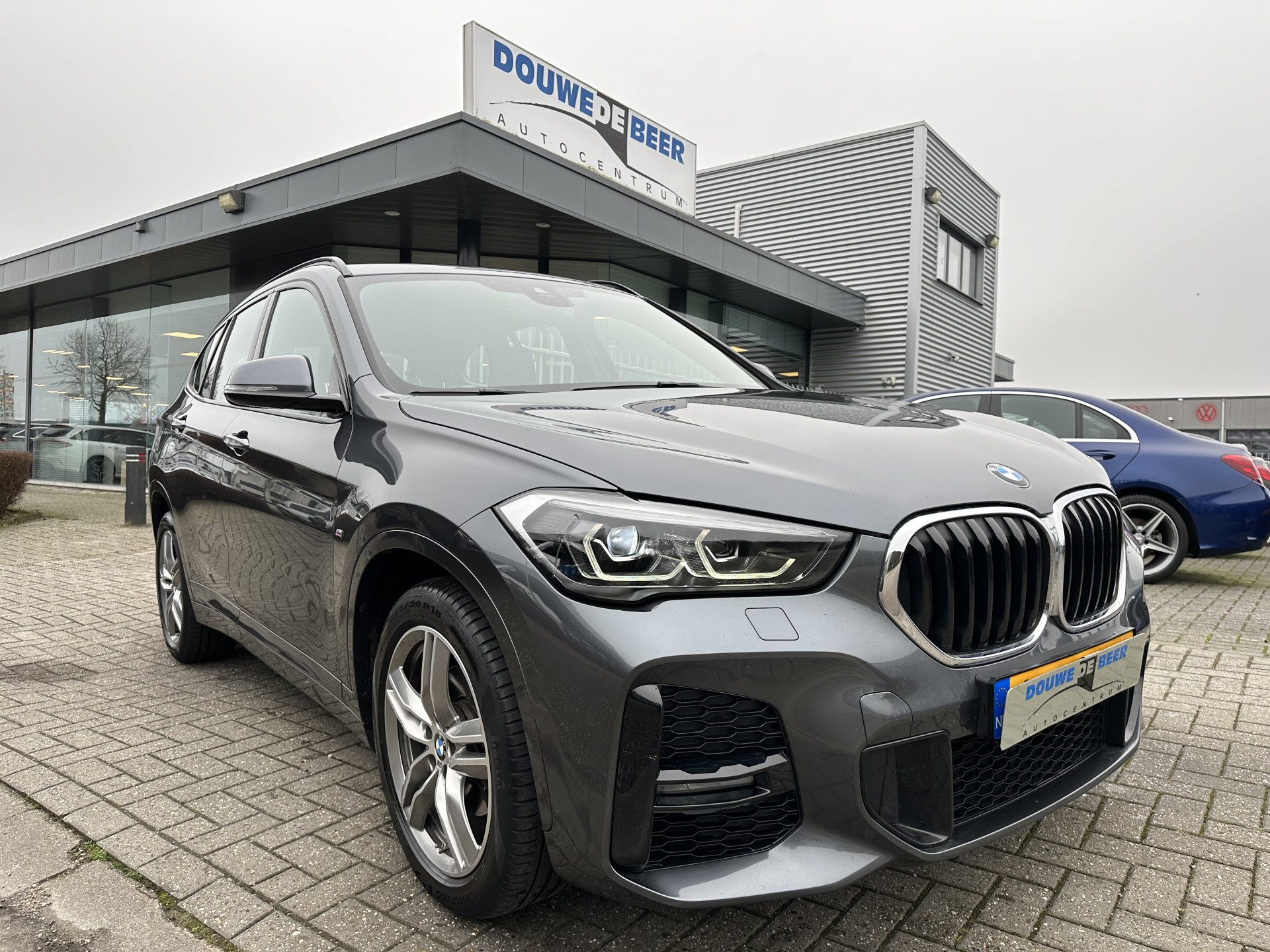 BMW X1 sDrive18i M sport aut spiegelpakket, navi, LED bij viaBOVAG.nl