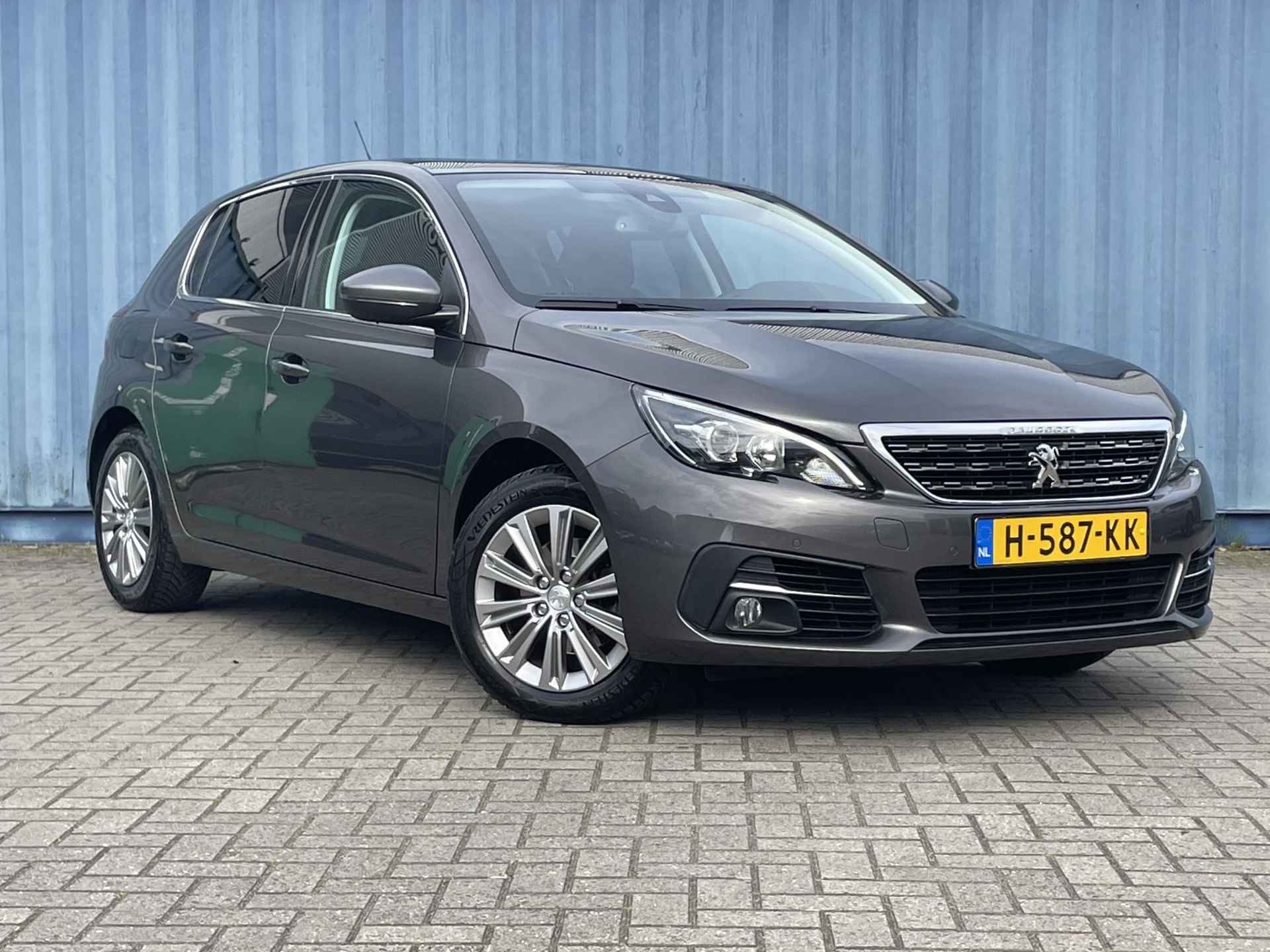 Peugeot 308 1.2 Premium 130 PK l Achteruitrijcamera l Climate Control l Apple Carplay/ Android auto l Armsteun l Cruise Control l DAB l Getinte ramen l 16" Lichtmetalen velgen l Navigatie l Panoramadak l Parkeersensoren V+A l Rijstrooksensoren l - 5/36