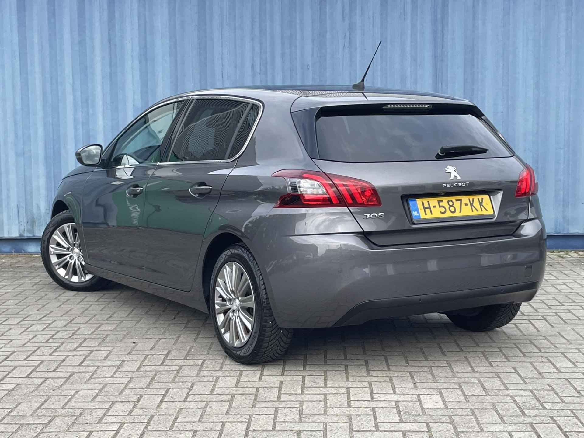 Peugeot 308 1.2 Premium 130 PK l Achteruitrijcamera l Climate Control l Apple Carplay/ Android auto l Armsteun l Cruise Control l DAB l Getinte ramen l 16" Lichtmetalen velgen l Navigatie l Panoramadak l Parkeersensoren V+A l Rijstrooksensoren l - 11/36