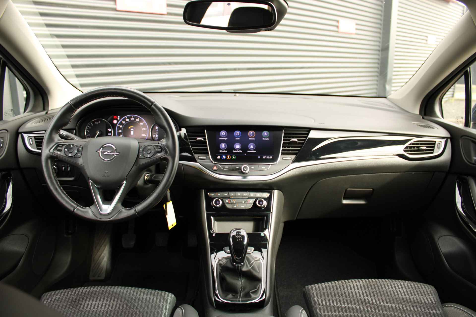 Opel Astra 1.2 T. 130pk Elegance 5drs / Navigatie / Winterpakket / Camera / Park Pilot V+A / Carplay / 17"LMV / Cruise Control / LED / "Vraag een vrijblijvende offerte aan!" - 5/31