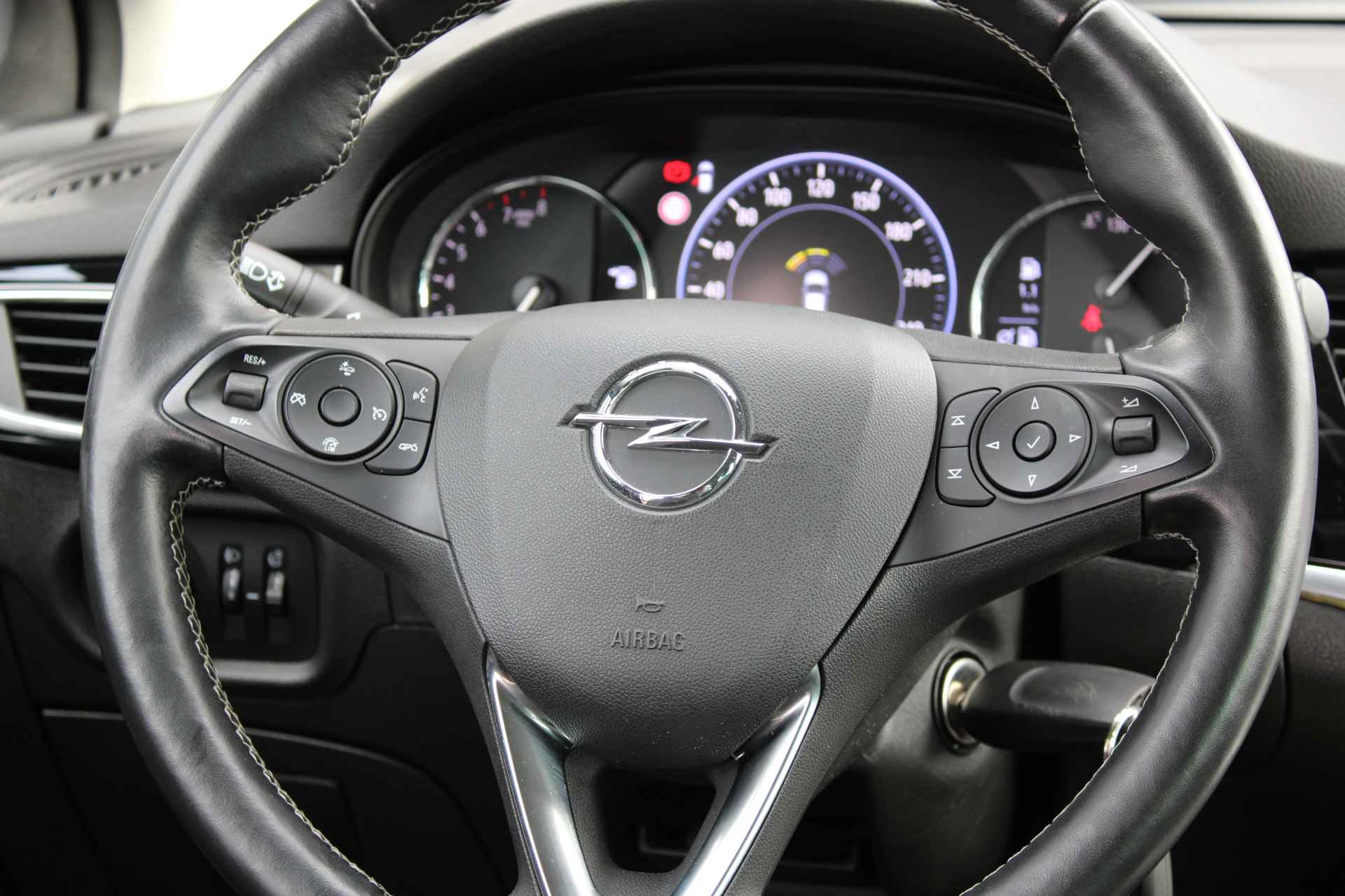Opel Astra 1.2 T. 130pk Elegance 5drs / Navigatie / Winterpakket / Camera / Park Pilot V+A / Carplay / 17"LMV / Cruise Control / LED / "Vraag een vrijblijvende offerte aan!" - 6/31