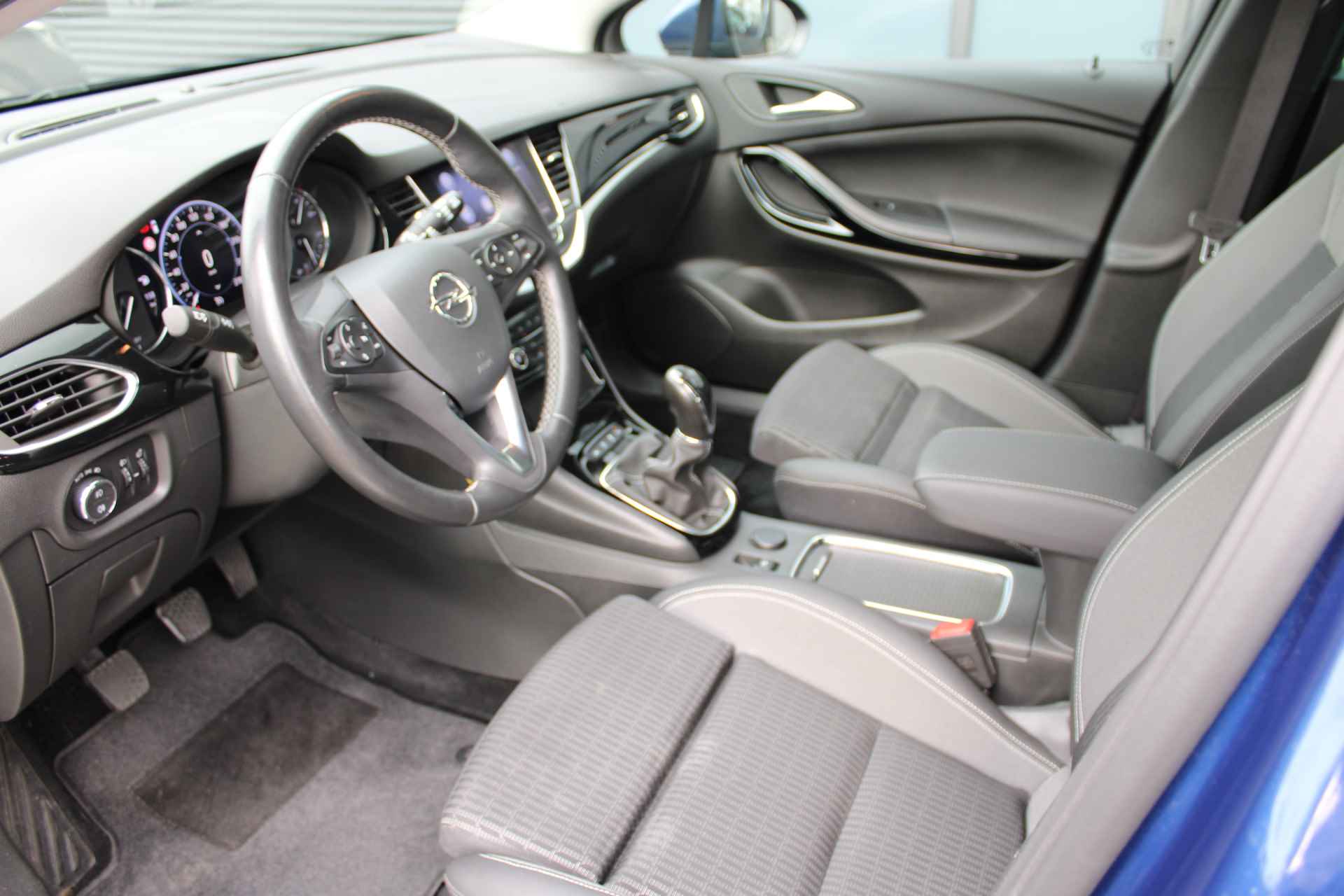 Opel Astra 1.2 T. 130pk Elegance 5drs / Navigatie / Winterpakket / Camera / Park Pilot V+A / Carplay / 17"LMV / Cruise Control / LED / "Vraag een vrijblijvende offerte aan!" - 8/31