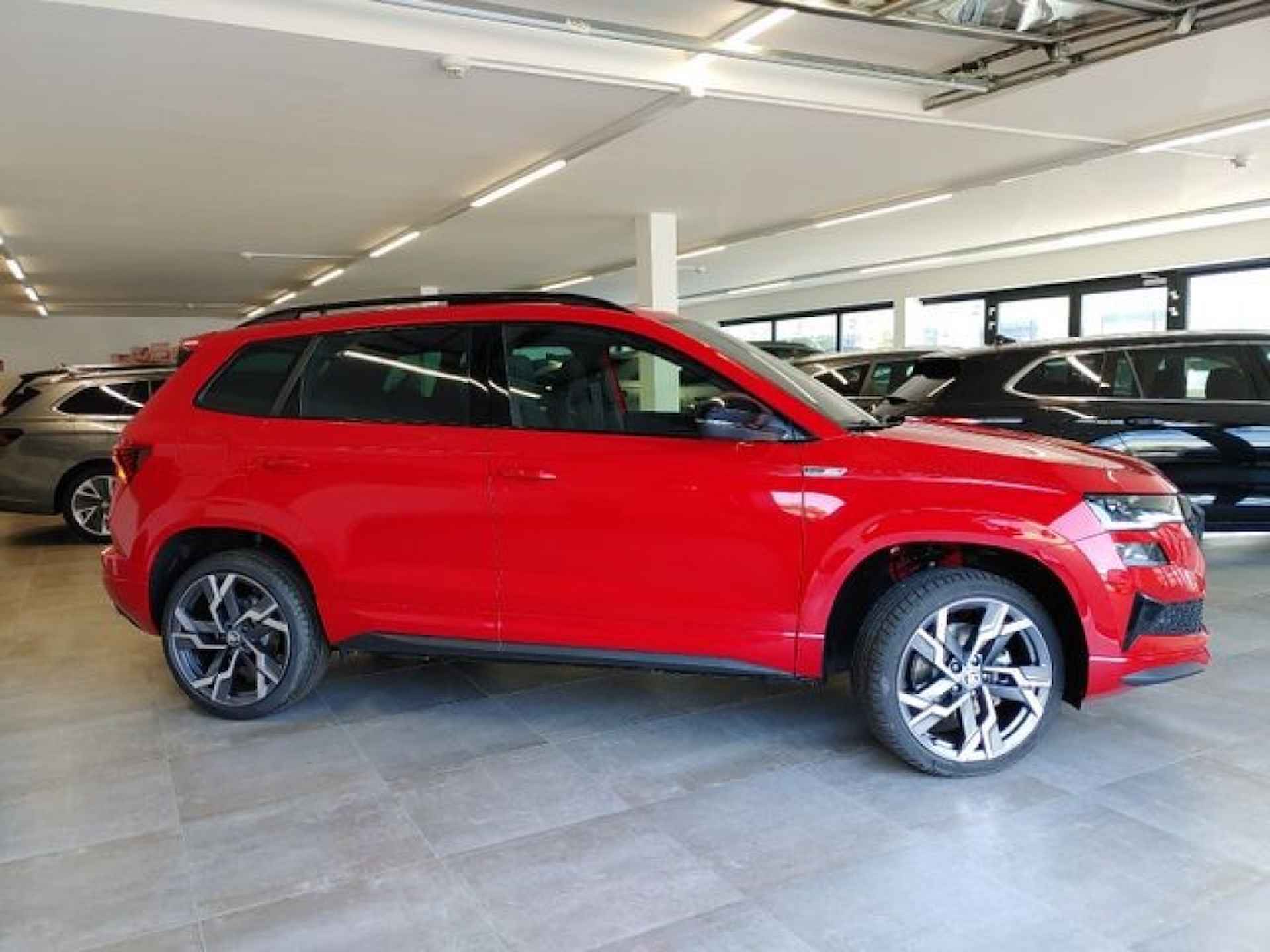 SKODA Karoq 1.5 TSI DSG SPORTLINE PANO-DAK/TREKHAAK/CAMERA/NAVI/STOELVERW - 7/16