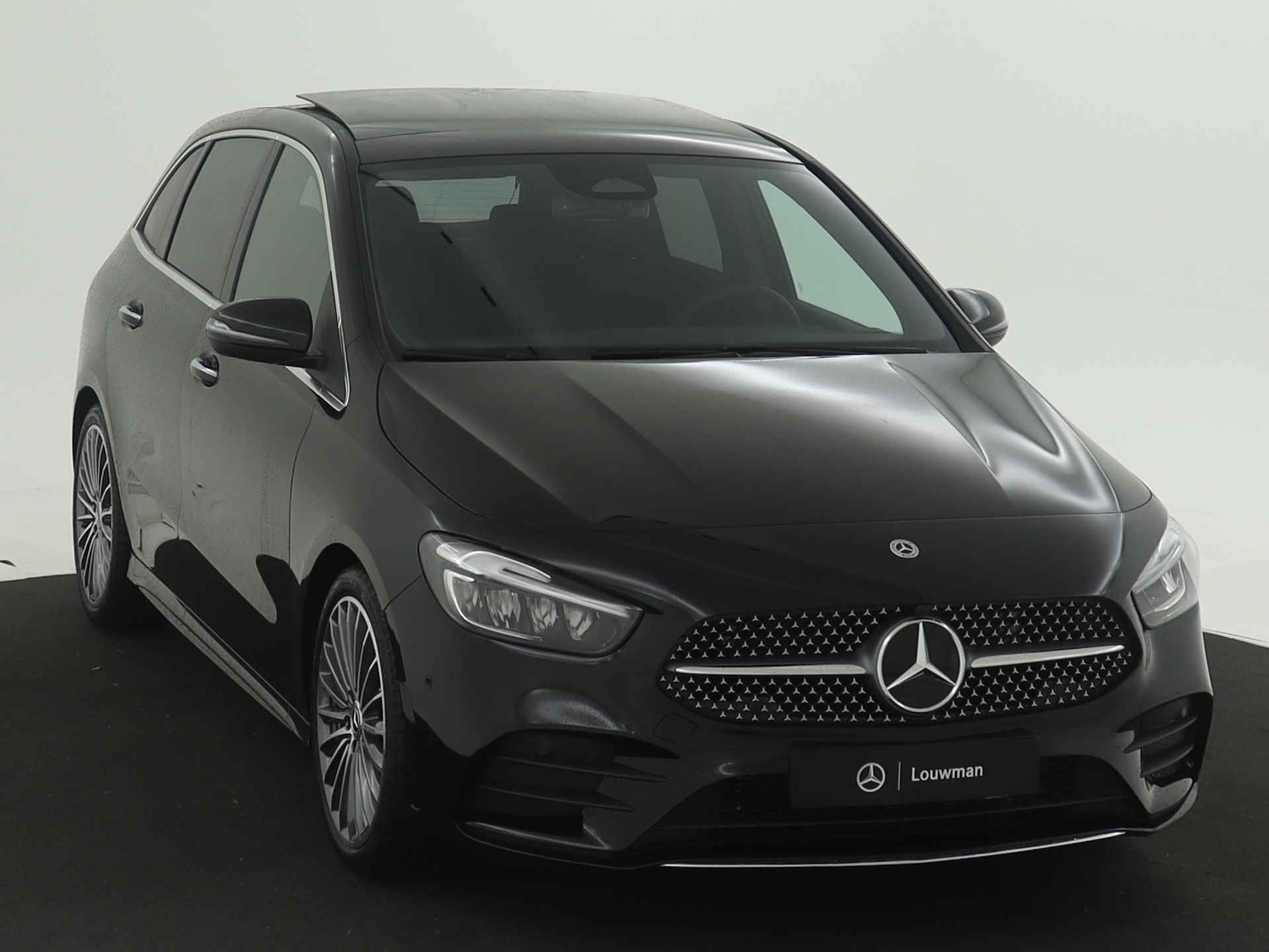 Mercedes-Benz B-Klasse 180 AMG Line | Premium pakket | Panorama-schuifdak | Bagageruimtepakket | (19 inch) multispaaks lichtmetalen AMG-velgen | Dodehoekassistent | Keyless-Go comfortpakket | Stoelverwarming vooraan | - 23/38