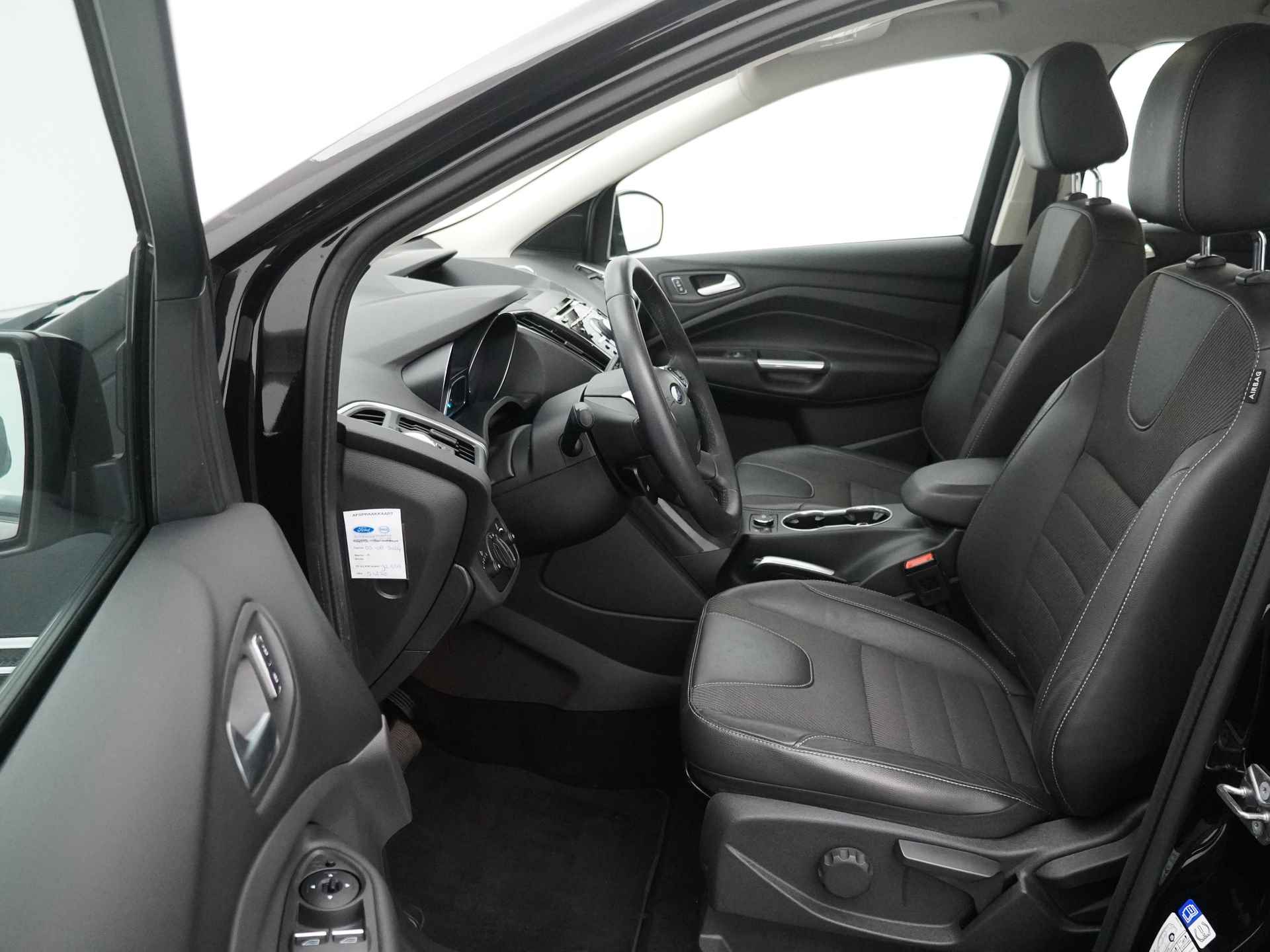 Ford Kuga 1.5 EcoBoost 183 pk Titanium 4WD | Camera | El. a. klep | Navi | Clima | Voorruitverw. | Stoelverw. | Half leer | 1e eig. | 100% dealer onderh. - 11/22