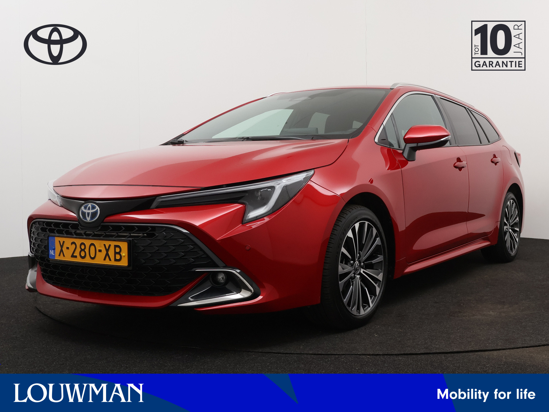 Toyota Corolla Touring Sports 1.8 Hybrid First Edition | Navigatie | Camera | Parkeersensoren | Climate Control | Cruise Control Adaptief | Stoelverwarming | Draadloze telefoonlader |