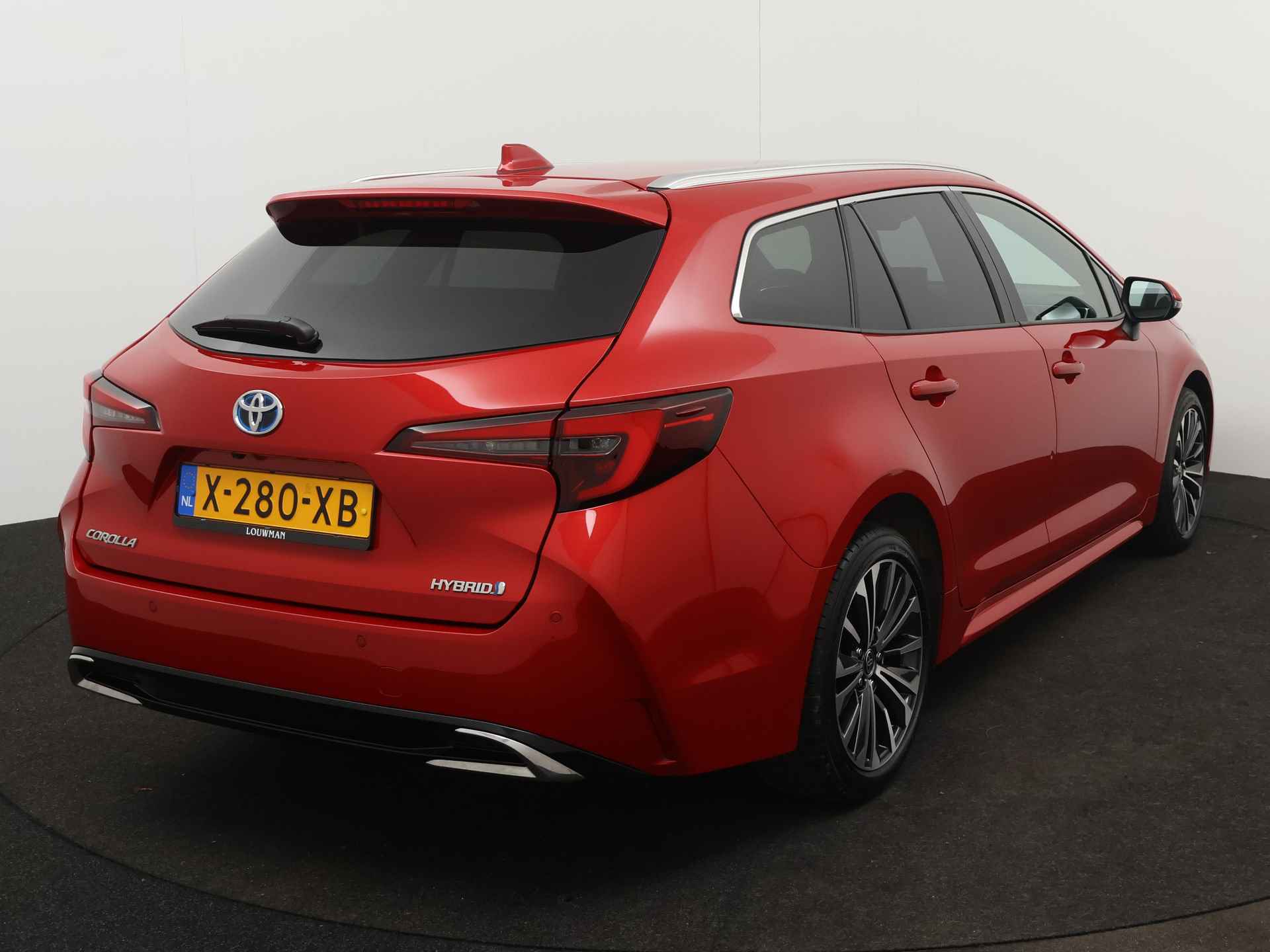 Toyota Corolla Touring Sports 1.8 Hybrid First Edition | Navigatie | Camera | Parkeersensoren | Climate Control | Cruise Control Adaptief | Stoelverwarming | Draadloze telefoonlader | - 18/46