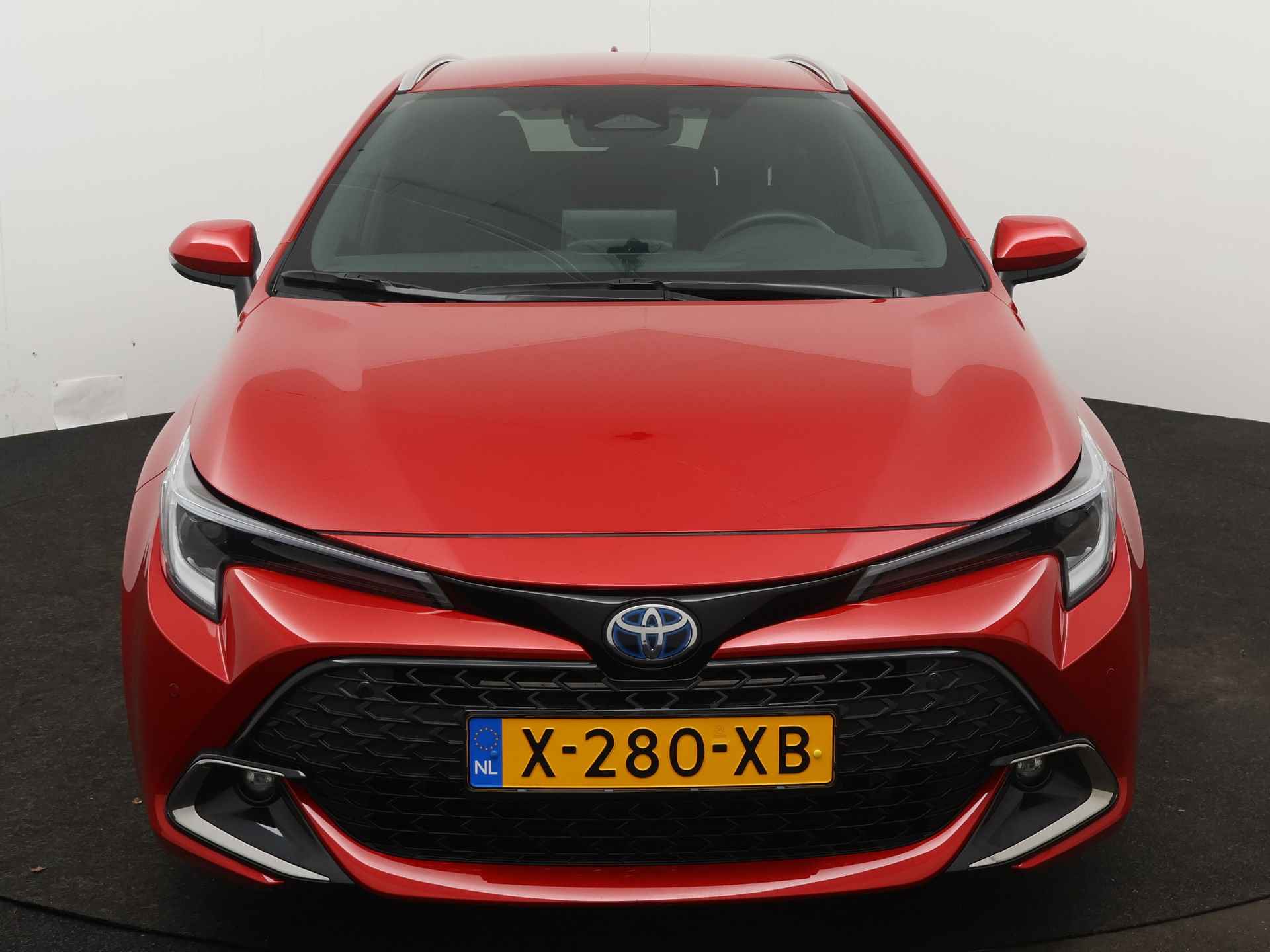 Toyota Corolla Touring Sports 1.8 Hybrid First Edition | Navigatie | Camera | Parkeersensoren | Climate Control | Cruise Control Adaptief | Stoelverwarming | Draadloze telefoonlader | - 28/46