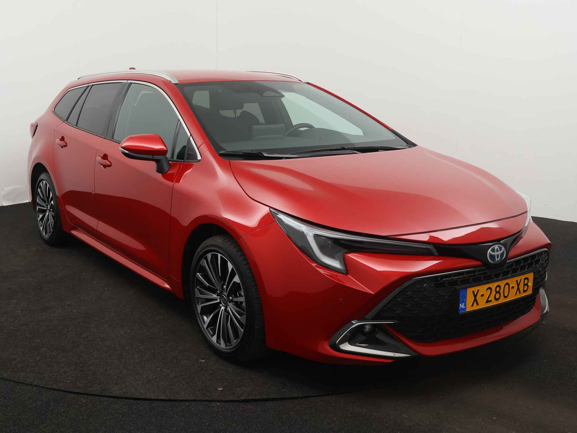 Toyota Corolla Touring Sports 1.8 Hybrid First Edition | Navigatie | Camera | Parkeersensoren | Climate Control | Cruise Control Adaptief | Stoelverwarming | Draadloze telefoonlader | - 29/46