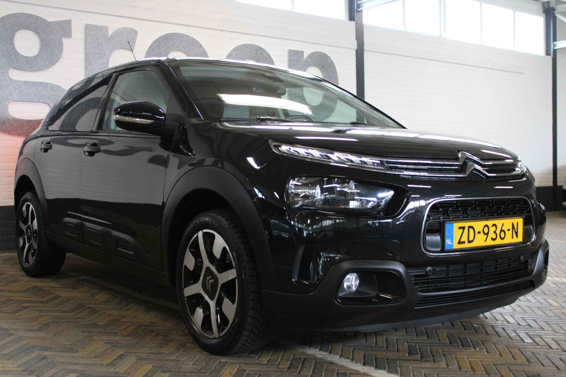 Citroën C4 Cactus 1.2 PureTech Shine | Incl. 12 maanden garantie | 1ste eigenaar! | Cruise control | Panorama dak | Climate control | Stoelverwarming | Navigatie | Apple carplay/Android auto | 100% onderhouden | - 9/47