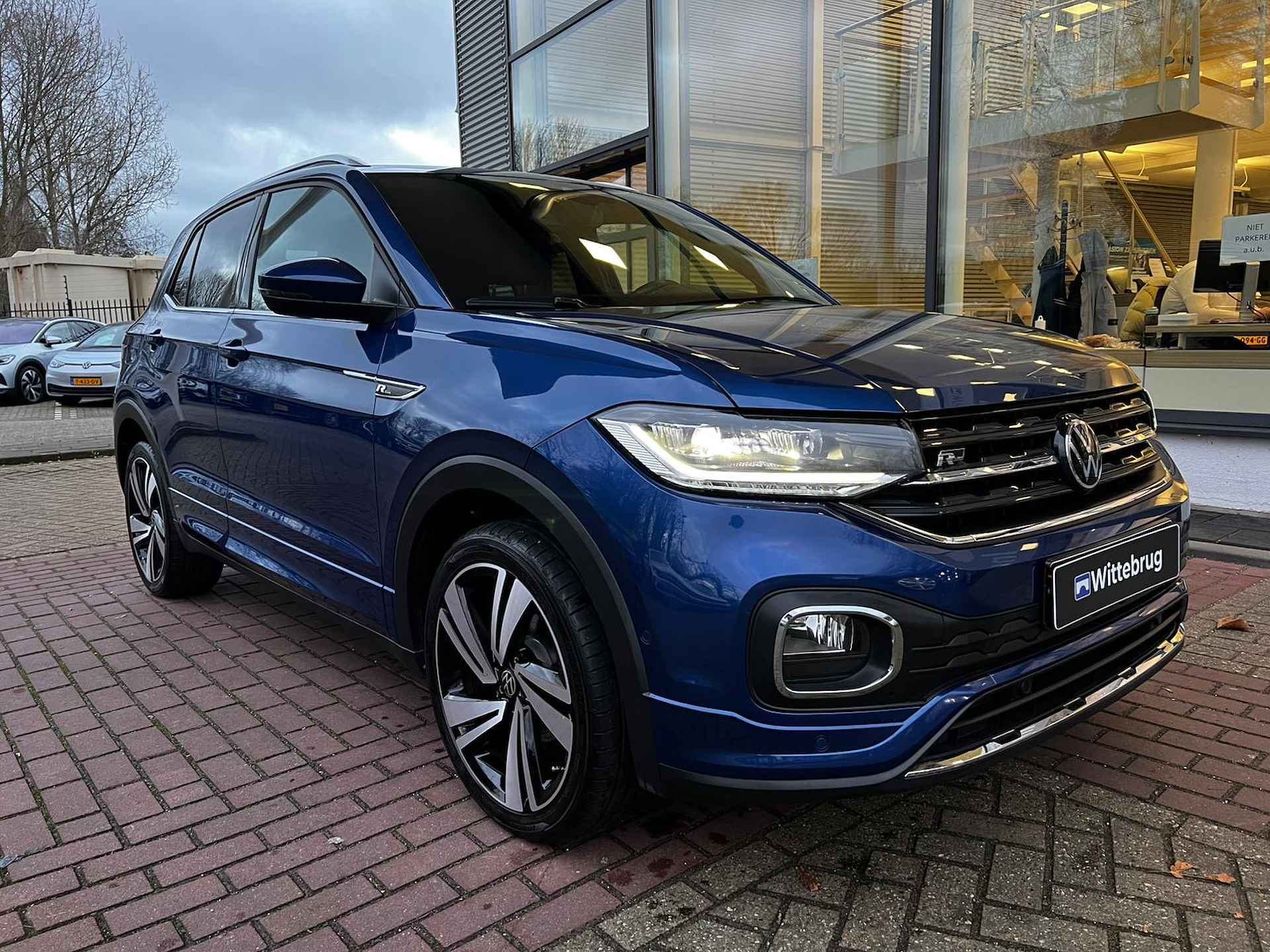 Volkswagen T-Cross 1.0 TSI R-Line / Achteruitrijcamera / Virtual Cockpit / DSG / 18 Inch / Side Assist / Adaptive Cruise Control / 12 Maanden Garantie! - 7/27