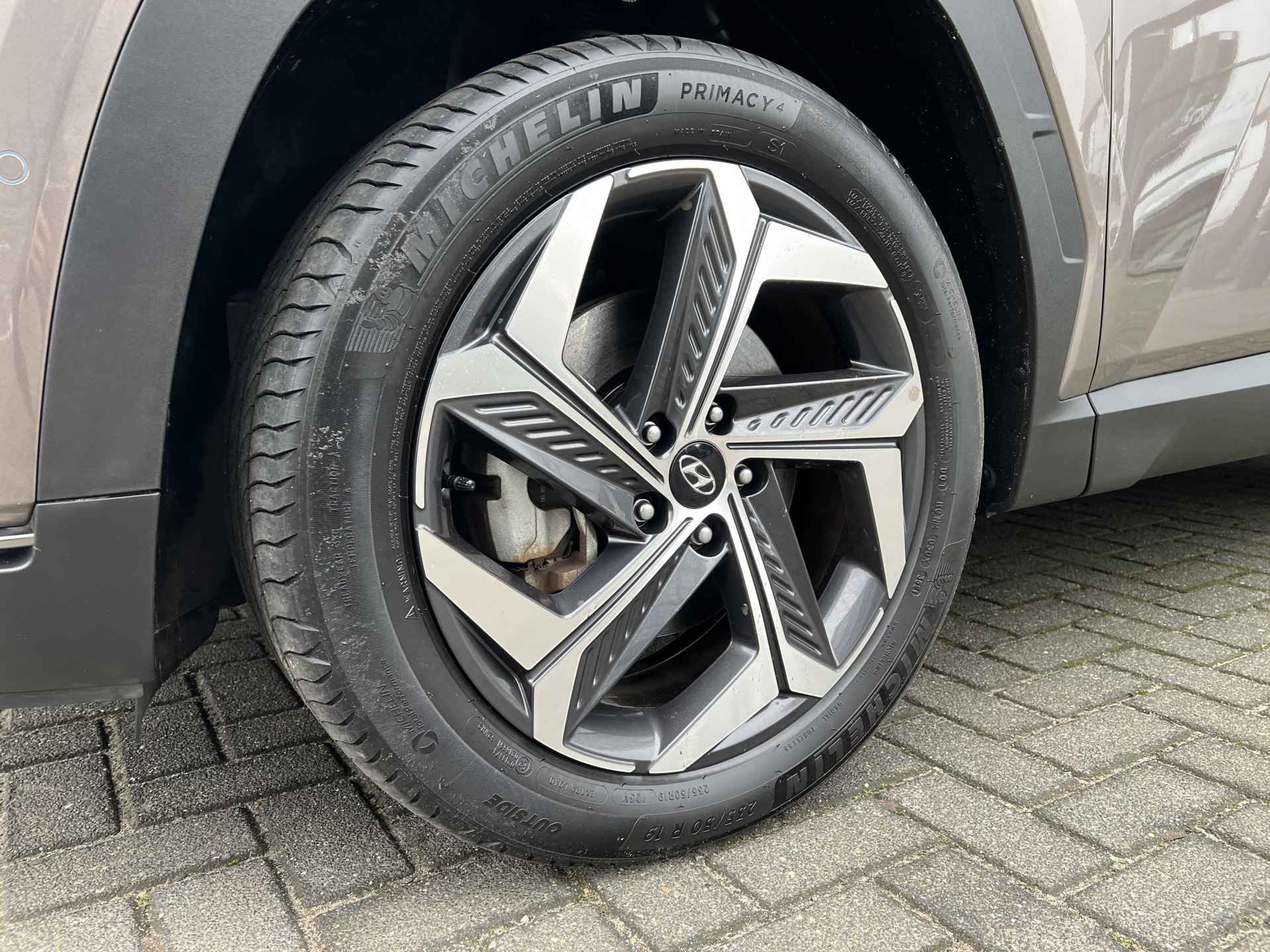 Hyundai Tucson 1.6 T-GDI HEV 230pk | Elektrische achterklep | Stoelventilatie | Leder | Adaptive cruise controle | Bestuurdersstoel met geheuge - 7/38