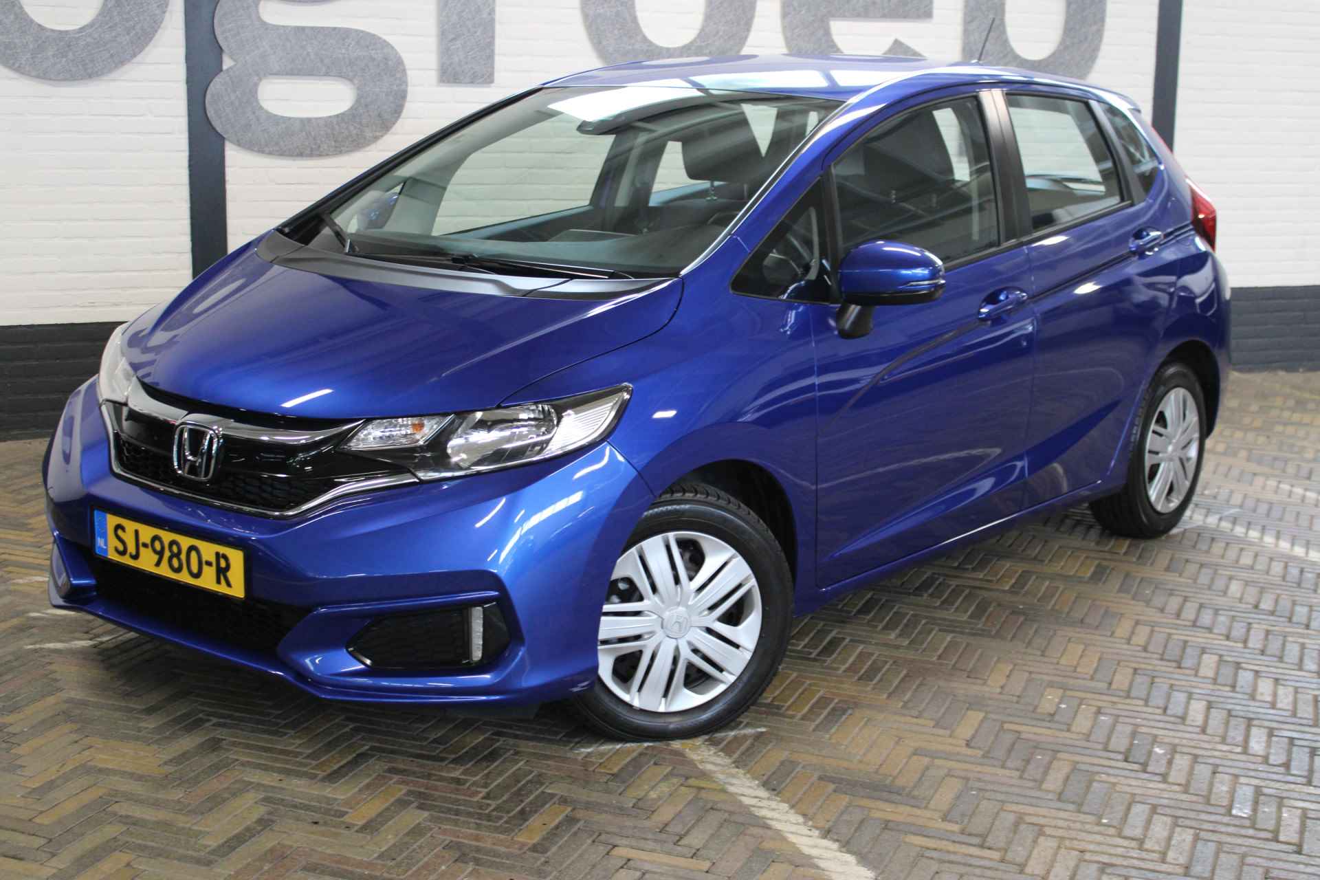 Honda Jazz 1.3 i-VTEC Trend | Incl. 12 maanden garantie | 100% dealeronderhouden | Cruise control | Airco | Radio | Automaat | Stoelverwarming | Parkeersensoren | Bluetooth | - 6/50