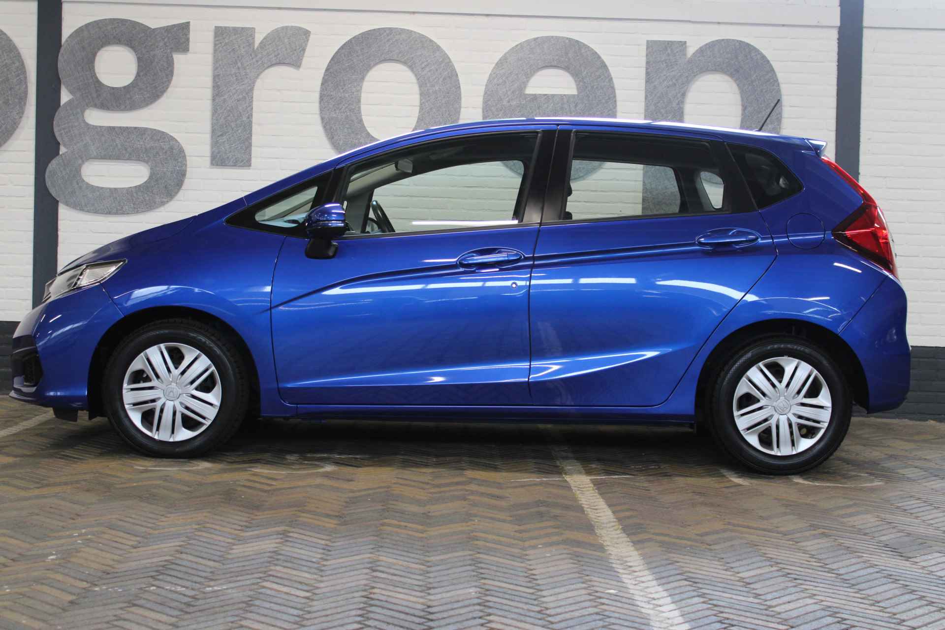 Honda Jazz 1.3 i-VTEC Trend | Incl. 12 maanden garantie | 100% dealeronderhouden | Cruise control | Airco | Radio | Automaat | Stoelverwarming | Parkeersensoren | Bluetooth | - 13/50