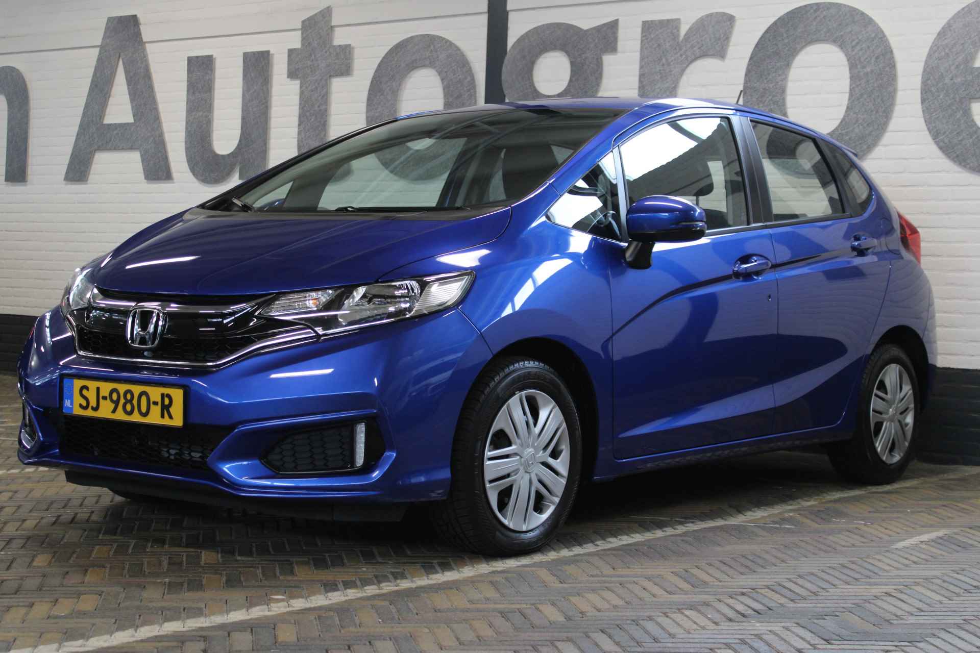 Honda Jazz 1.3 i-VTEC Trend | Incl. 12 maanden garantie | 100% dealeronderhouden | Cruise control | Airco | Radio | Automaat | Stoelverwarming | Parkeersensoren | Bluetooth | - 17/50