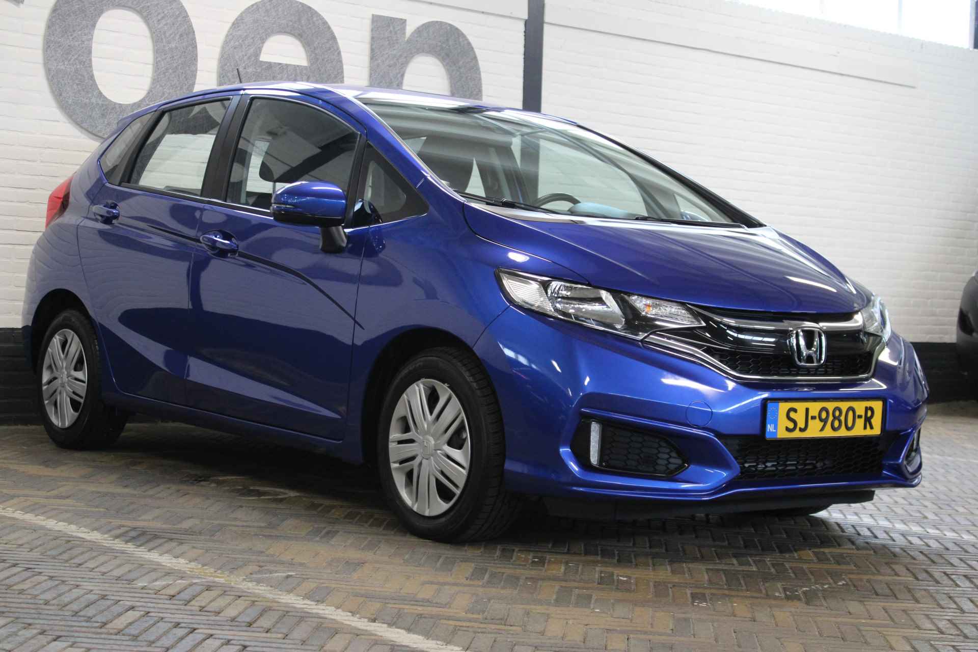 Honda Jazz 1.3 i-VTEC Trend | Incl. 12 maanden garantie | 100% dealeronderhouden | Cruise control | Airco | Radio | Automaat | Stoelverwarming | Parkeersensoren | Bluetooth | - 19/50