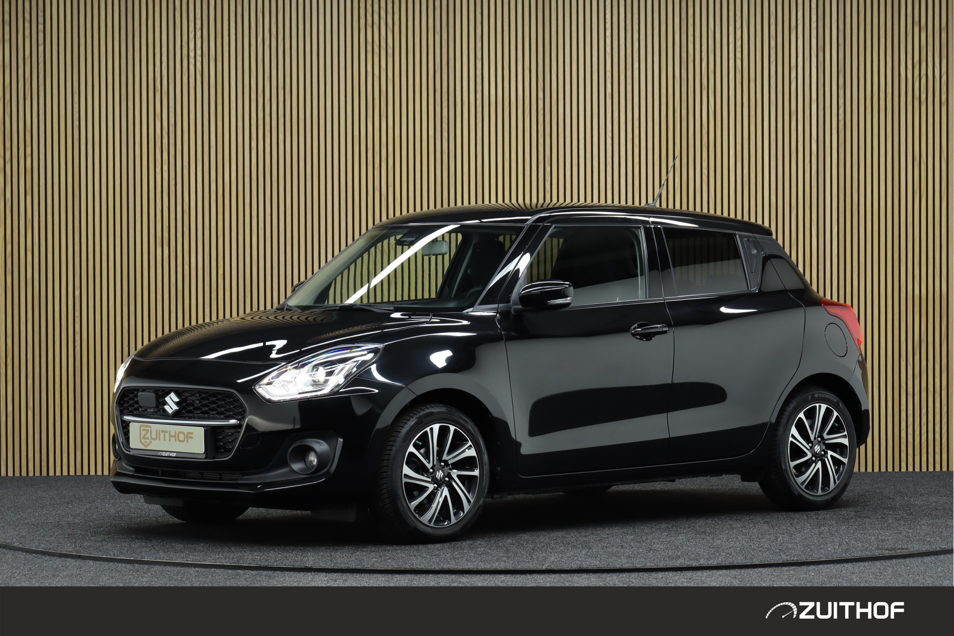 Suzuki Swift 1.2 Style Smart Hybrid | Adaptive-cruise | Camera | Navigatie | Dodehoekdetectie | Keyless | Camera | Trekhaak | All-season Banden