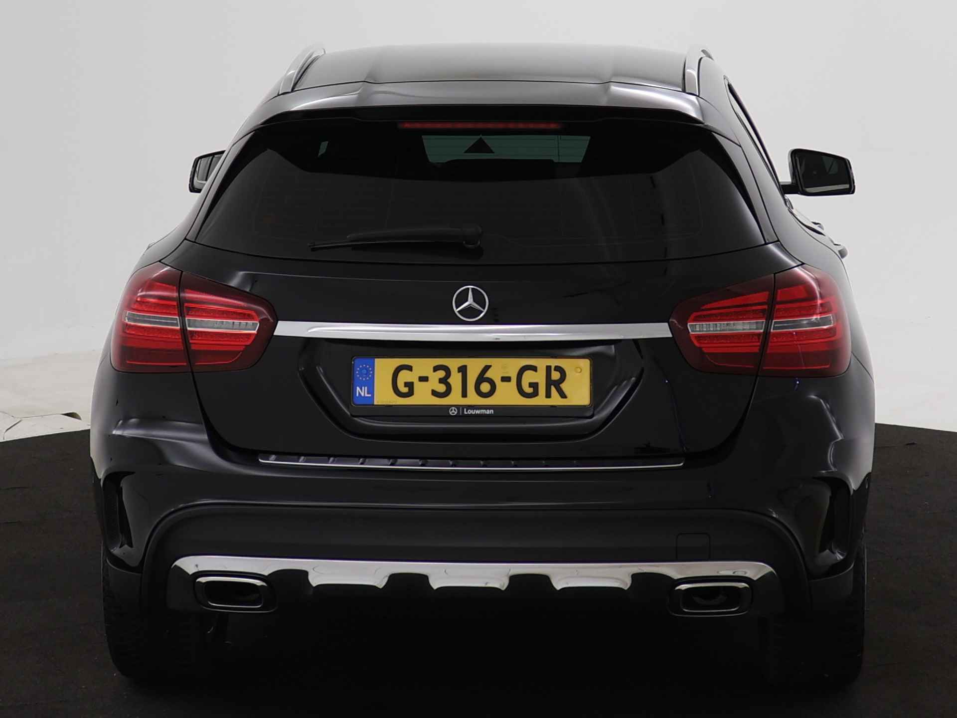 Mercedes-Benz GLA 180 Business Solution AMG | Keyless Go | parkeerpakket met Camera | Stoelverwarming | LED | Navigatie | Inclusief 24 maanden Mercedes-Benz Certified garantie voor Europa. - 31/45