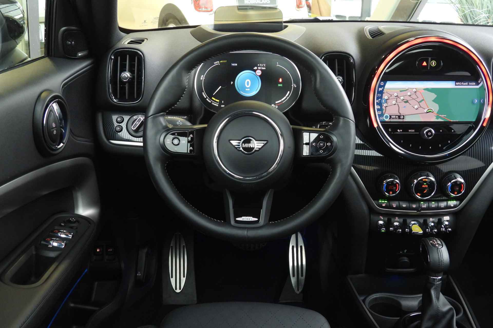 MINI Countryman Cooper SE ALL4 JCW Automaat / Panoramadak / Achteruitrijcamera / Active Cruise Control / Comfort Access / Park Assistant / Stoelverwarming - 4/42