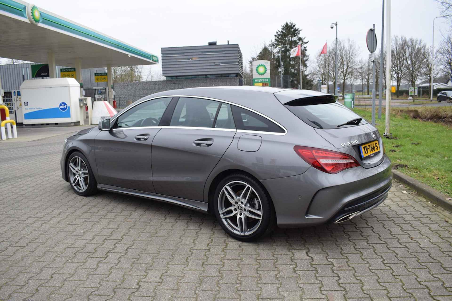 Mercedes-benz CLA-klasse Shooting Brake 180 AMG STYLING AUTOMAAT | SPORTSTOELEN | NAVI | RIJKLAAR! - 4/27