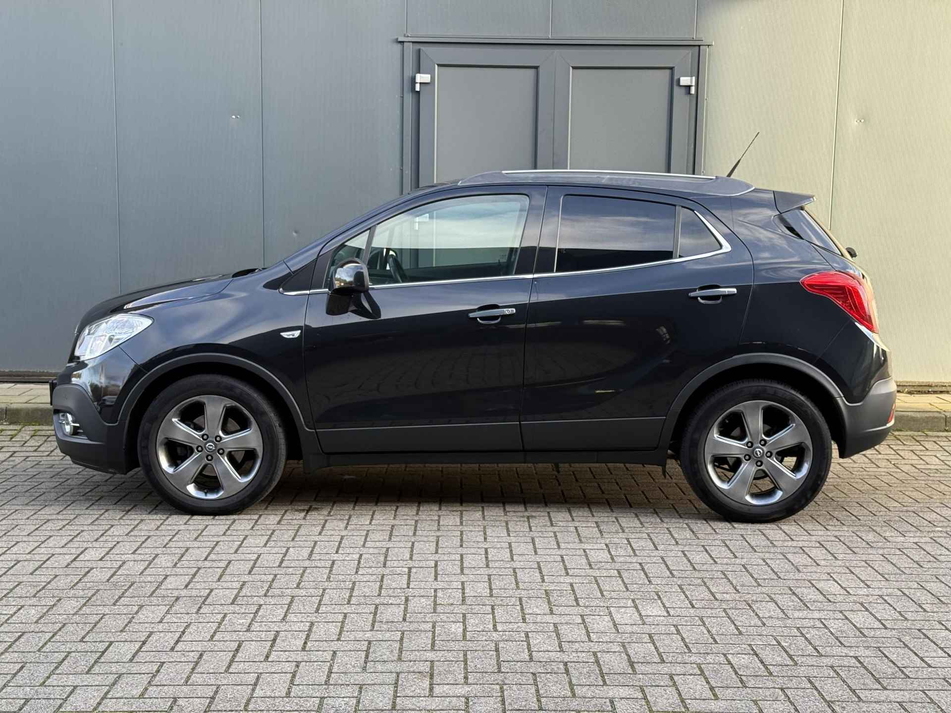 Opel Mokka 1.4 T Cosmo / Trekhaak ( 1200 kg trekgewicht) / Achteruitrijcamera / Cruise Control / Navigatie / NAP logisch / Airco - 9/31