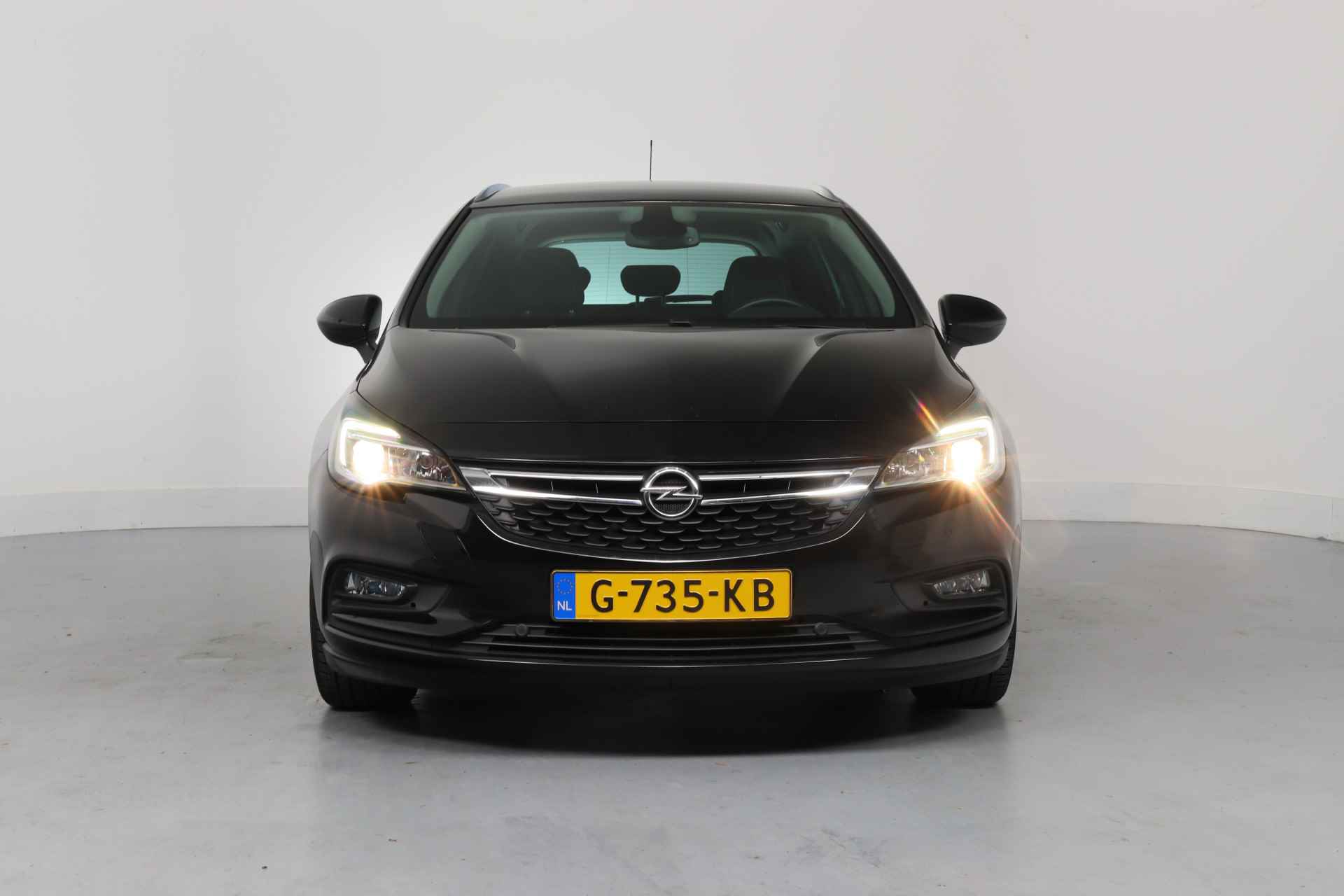 Opel Astra Sports Tourer 1.4 Turbo 120 Jaar Edition Automaat | 1e Eigenaar! | Trekhaak | Camera | Clima | Navi | Cruise Control | Parkeerse - 3/37