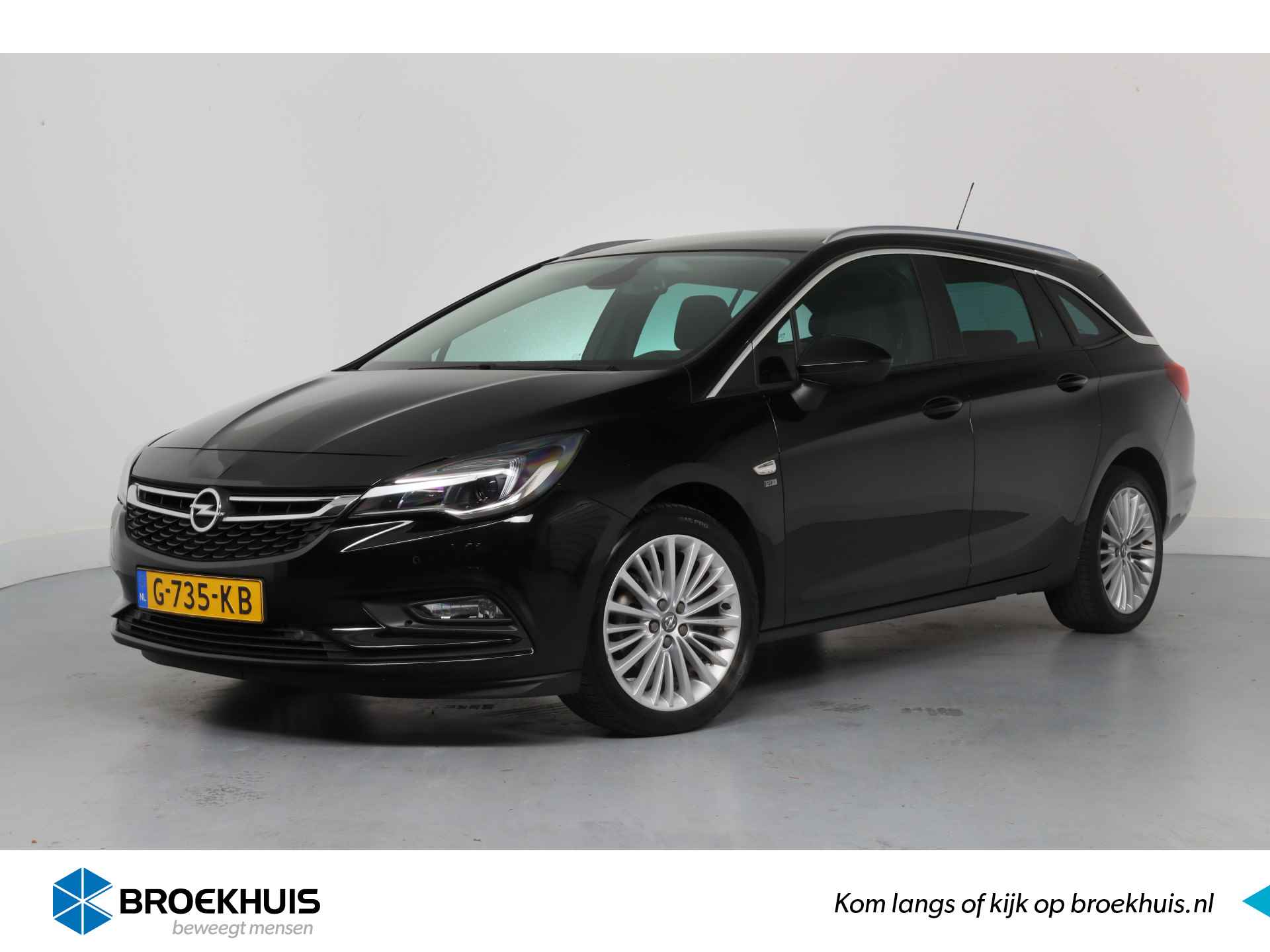 Opel Astra Sports Tourer 1.4 Turbo 120 Jaar Edition Automaat | 1e Eigenaar! | Trekhaak | Camera | Clima | Navi | Cruise Control | Parkeerse - 1/37