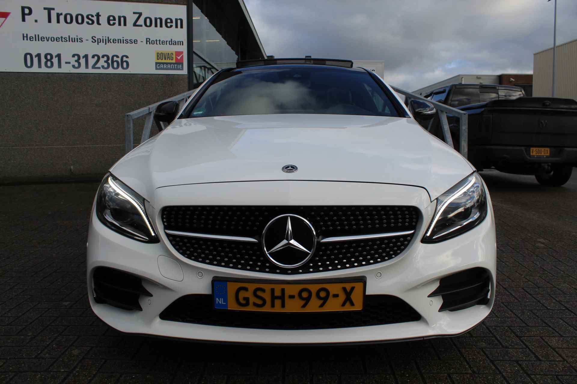 Mercedes-Benz C-Klasse Coupé 200 AMG Line Night Edition NIEUW MODEL Automaat Panoramadak/Sfeerverlichting/Apple Carplay/Achteruitrijcamera/Stoelverwarm - 7/25