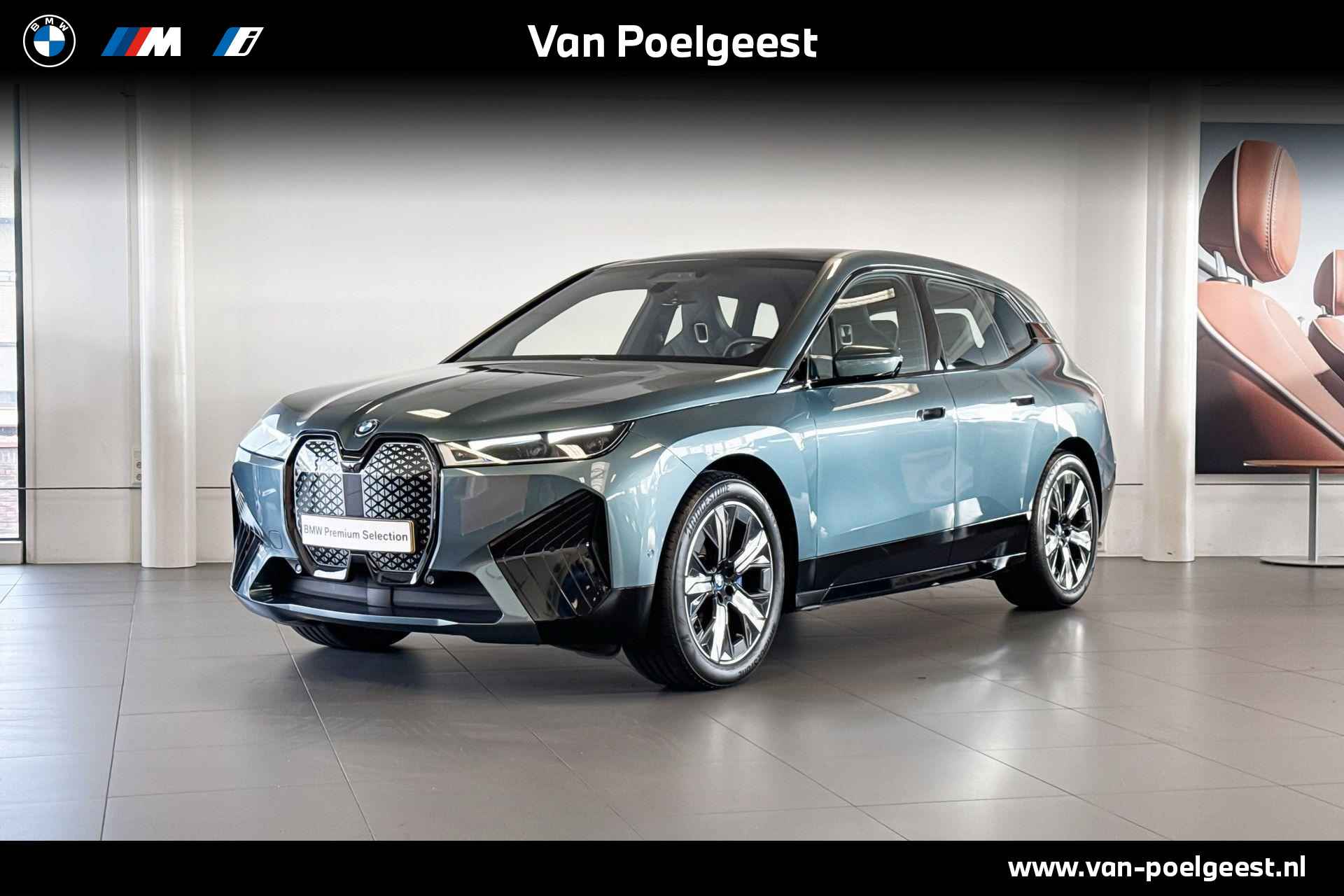 BMW iX xDrive40 Business Edition Plus 77 kWh | Sky Lounge | Stoelverwarming/ventilatie | Harman Kardon | Soft Close | - 1/28