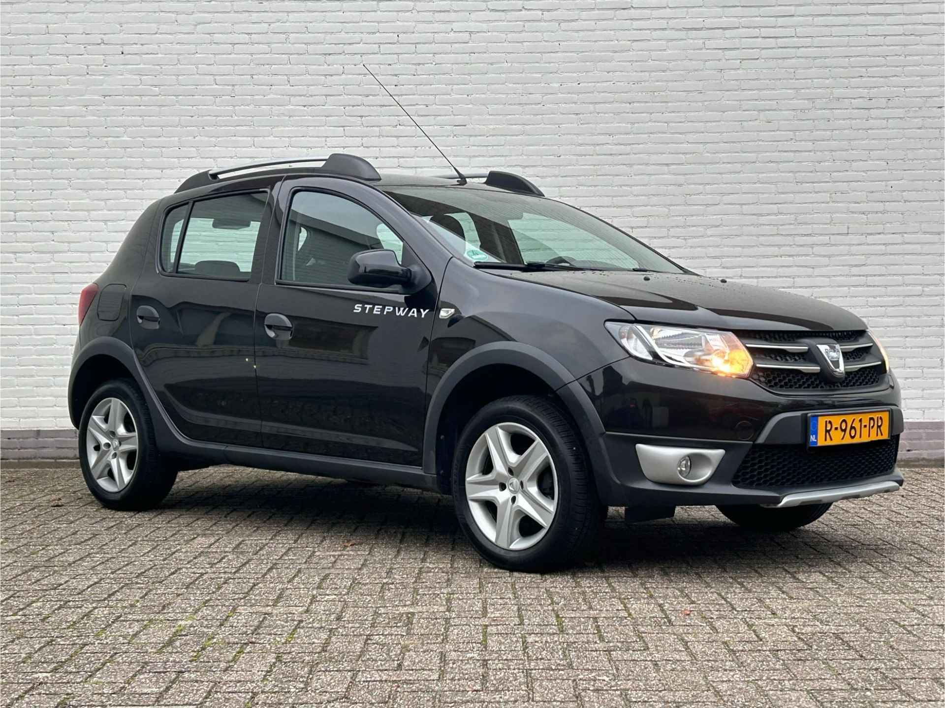 Dacia Sandero 0.9 TCe S&S Stepway Lauréate / Trekhaak / Airco / Bluetooth / Cruise control / Elektrische ramen / Mistlampen / - 28/36